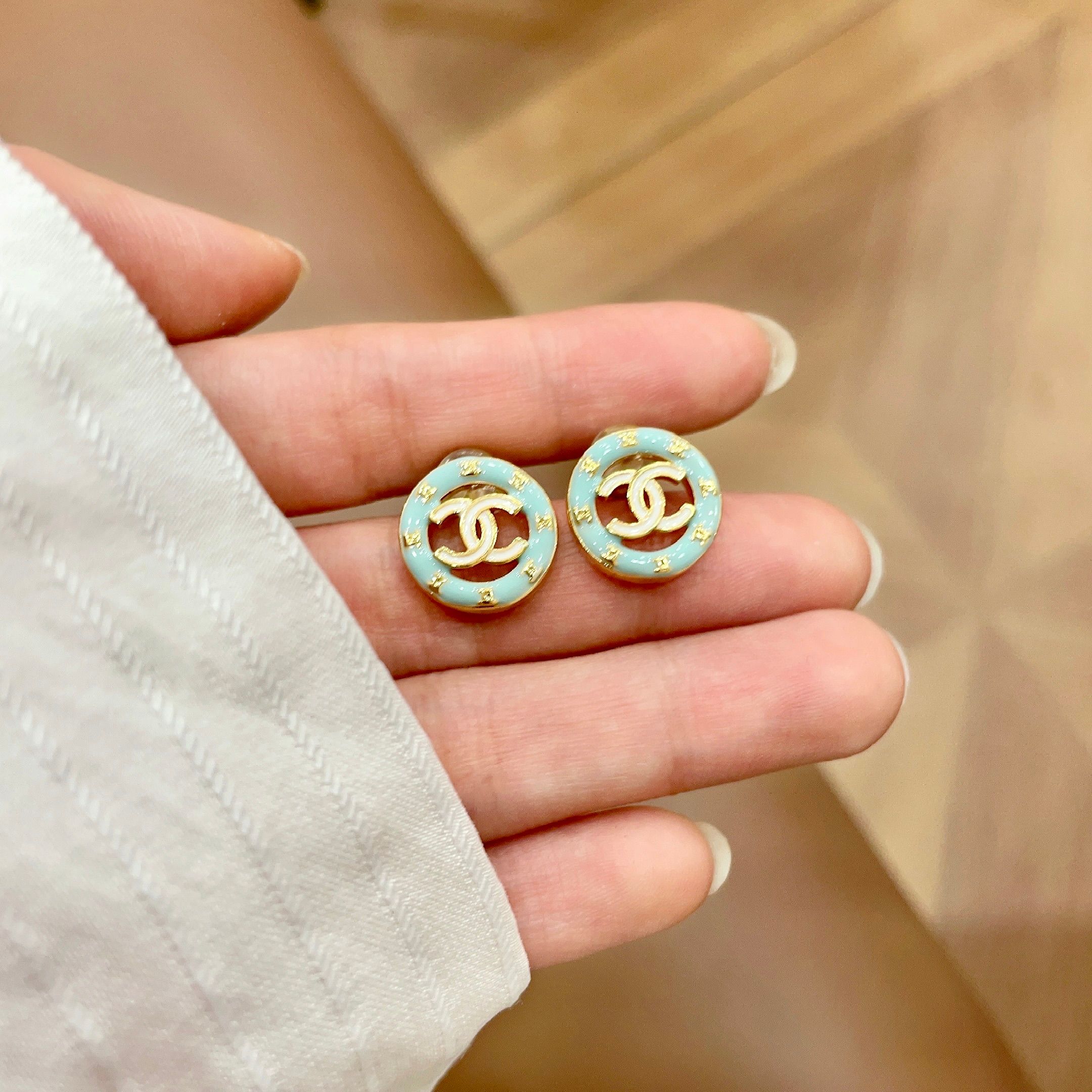 Chanel CC Logo Round Enamel Stud Earrings earrings Light gold tone metal with pastel mint blue enamel 1 2cm diameter