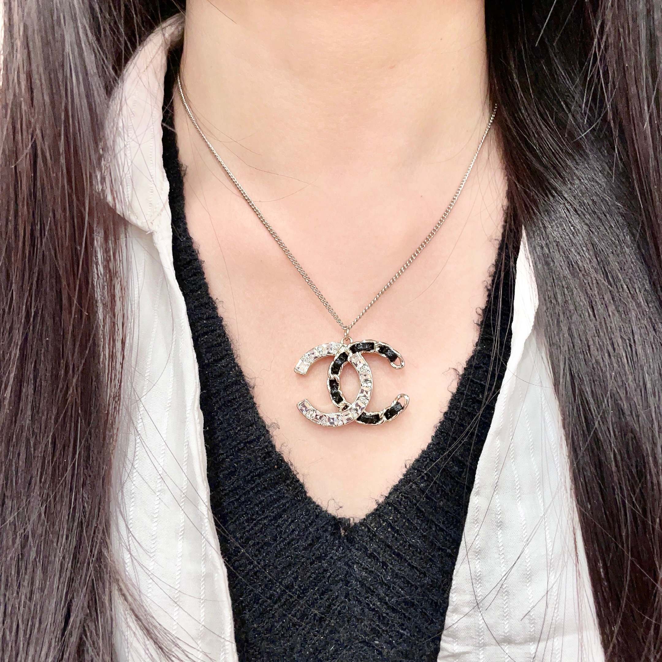 Chanel CC Logo Crystal Leather Woven Pendant Necklace necklace Gold-tone metal with clear faceted crystals and black woven leather accents 42cm