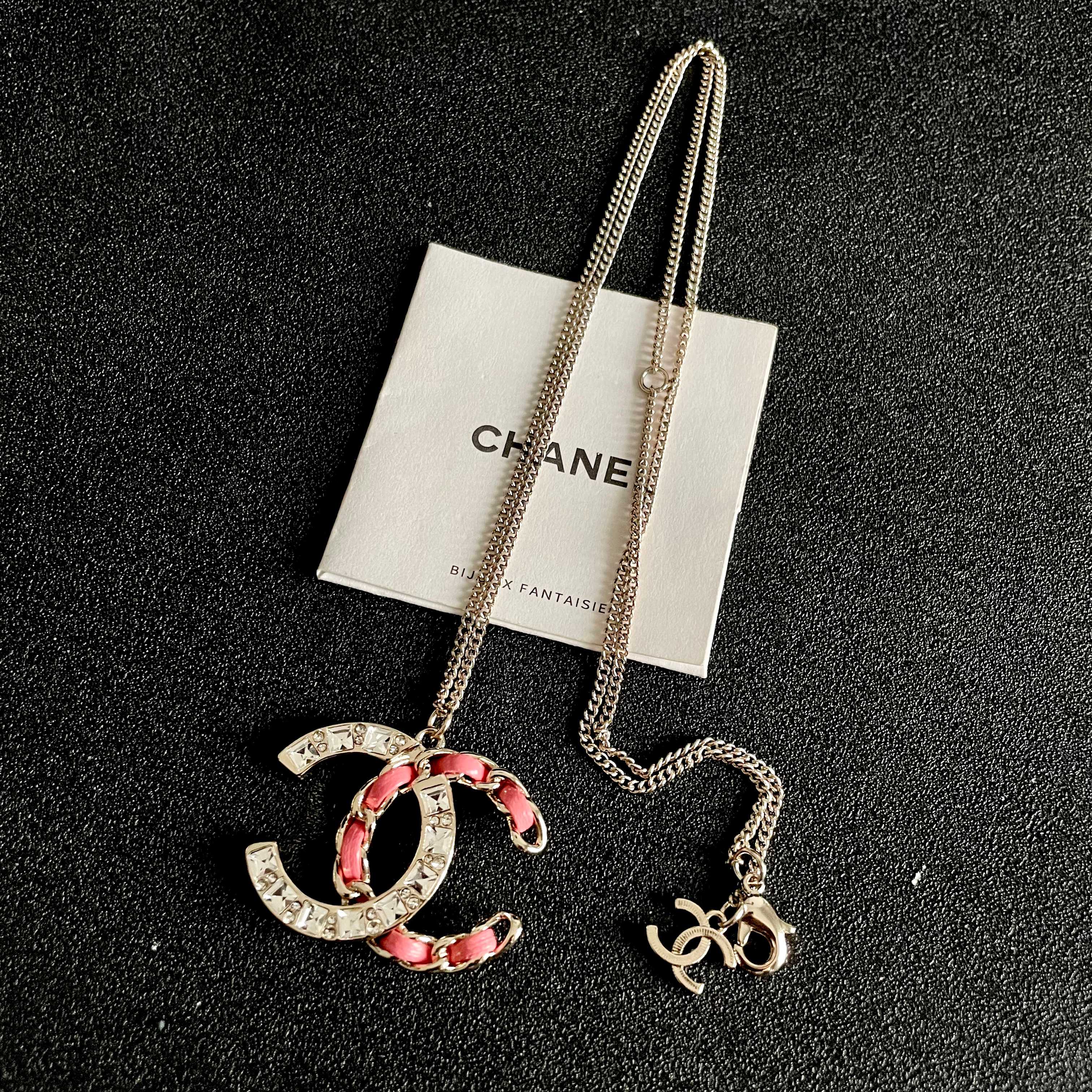 Chanel CC Logo Chain Woven Crystal Pendant Necklace necklace Light gold-tone metal with clear crystals and pink leather chain detailing 42cm