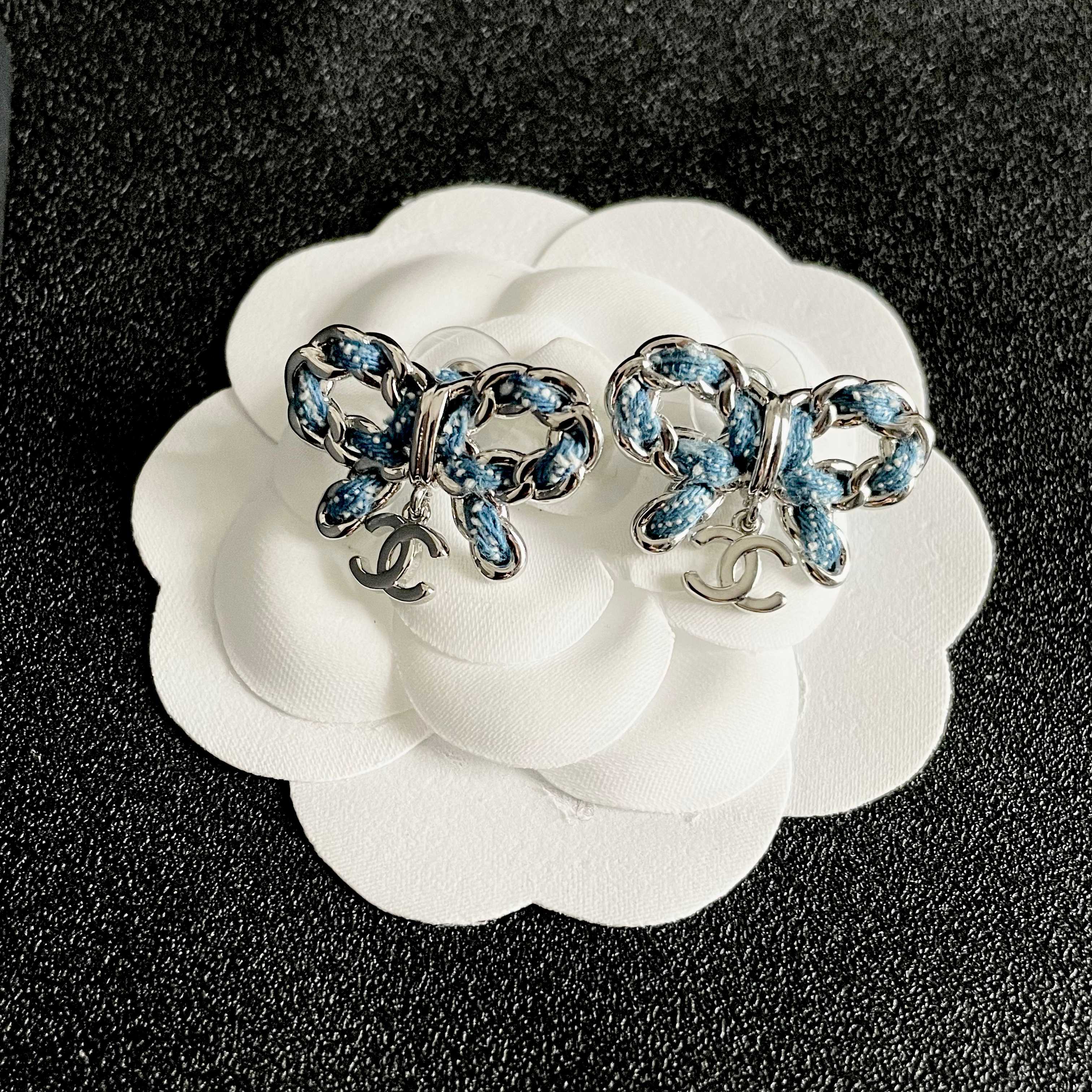 Chanel CC Bow Drop Earrings earrings Silver-tone metal with blue enamel and white dot detailing Gold-tone metal with black enamel detailing One Size 2cm width