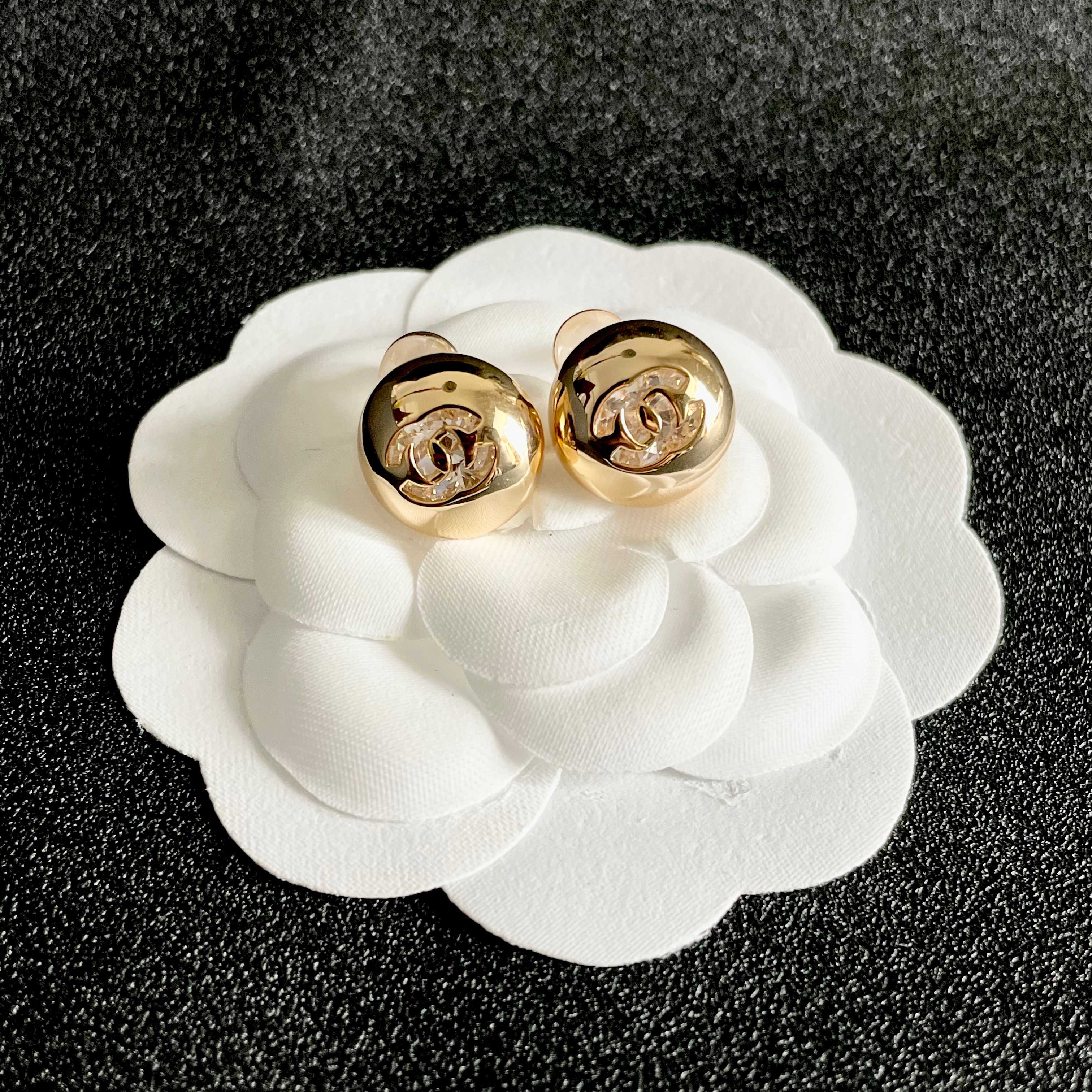 Chanel CC Logo Dome Stud Earrings earrings Gold-tone metal with clear crystal accents Silver-tone metal with clear crystal accents 12mm diameter