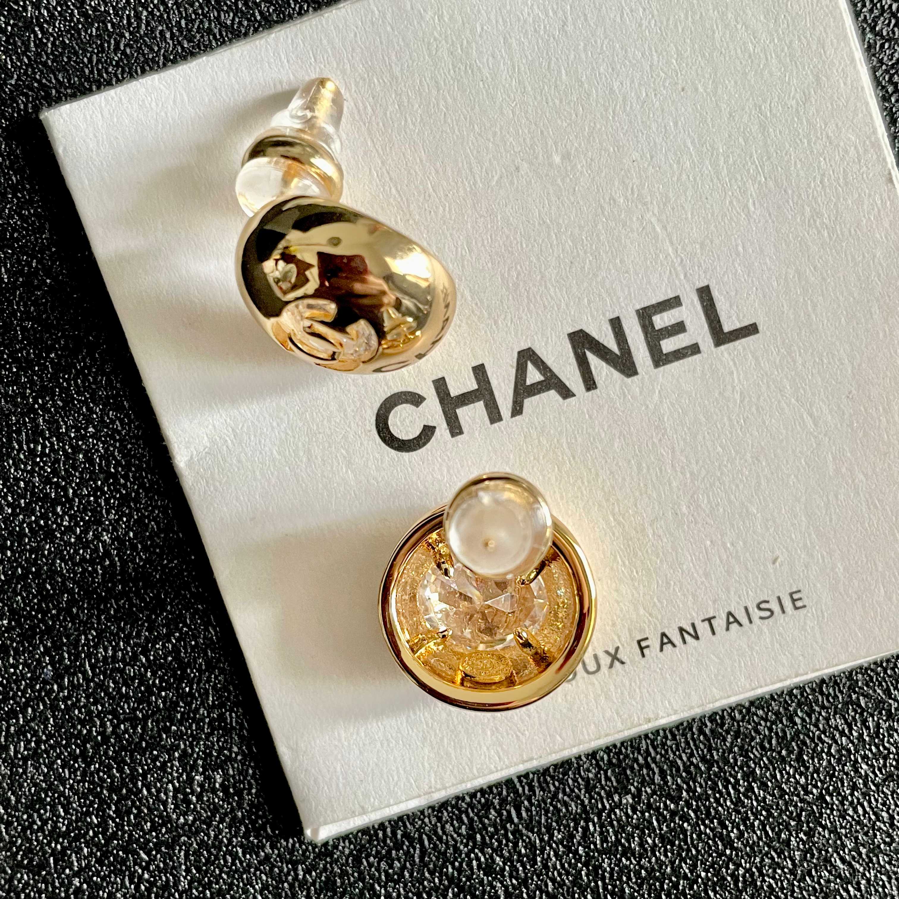 Chanel CC Logo Dome Stud Earrings earrings Gold-tone metal with clear crystal accents Silver-tone metal with clear crystal accents 12mm diameter