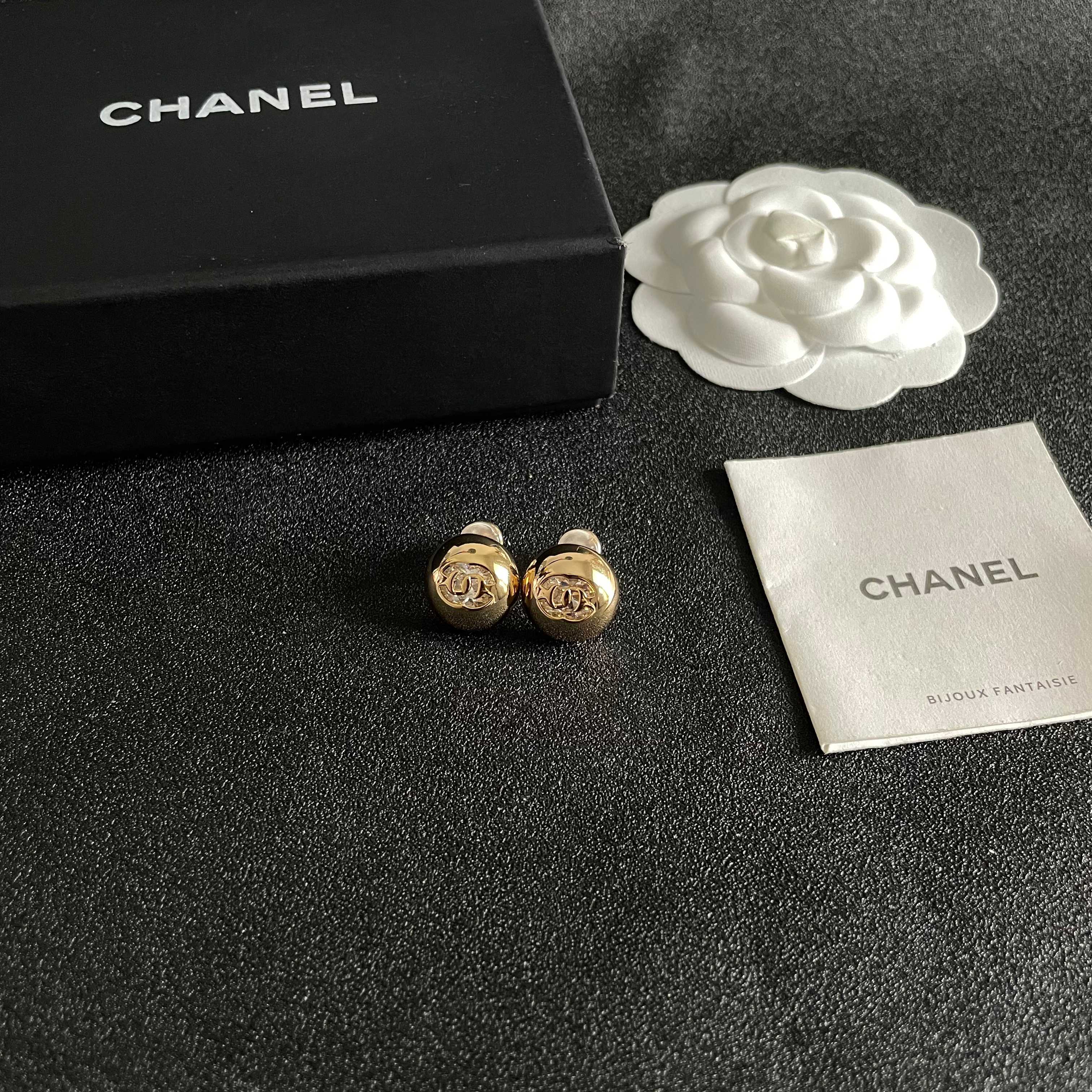 Chanel CC Logo Dome Stud Earrings earrings Gold-tone metal with clear crystal accents Silver-tone metal with clear crystal accents 12mm diameter