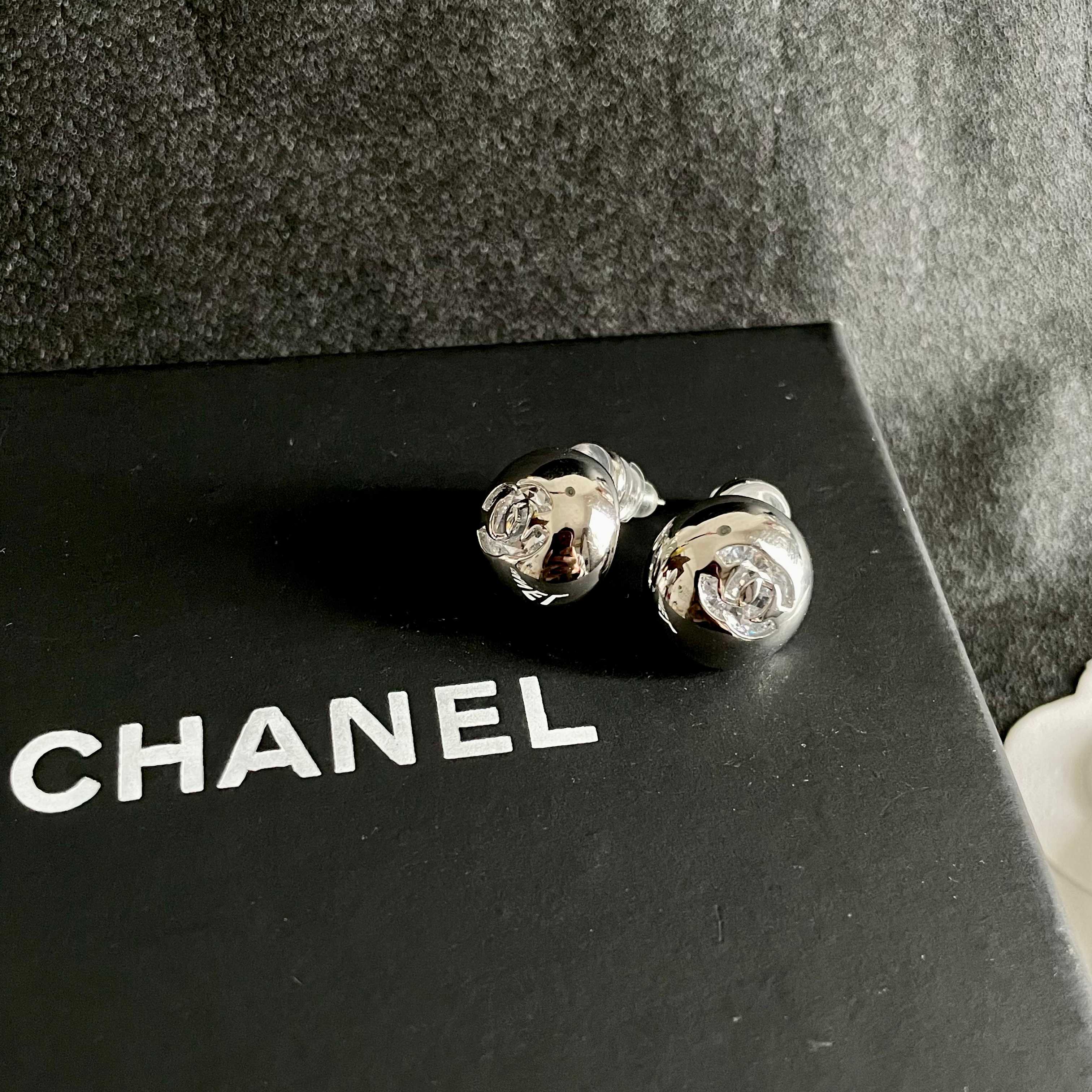 Chanel CC Logo Dome Stud Earrings earrings silver-tone metal with clear crystal accents 12mm diameter