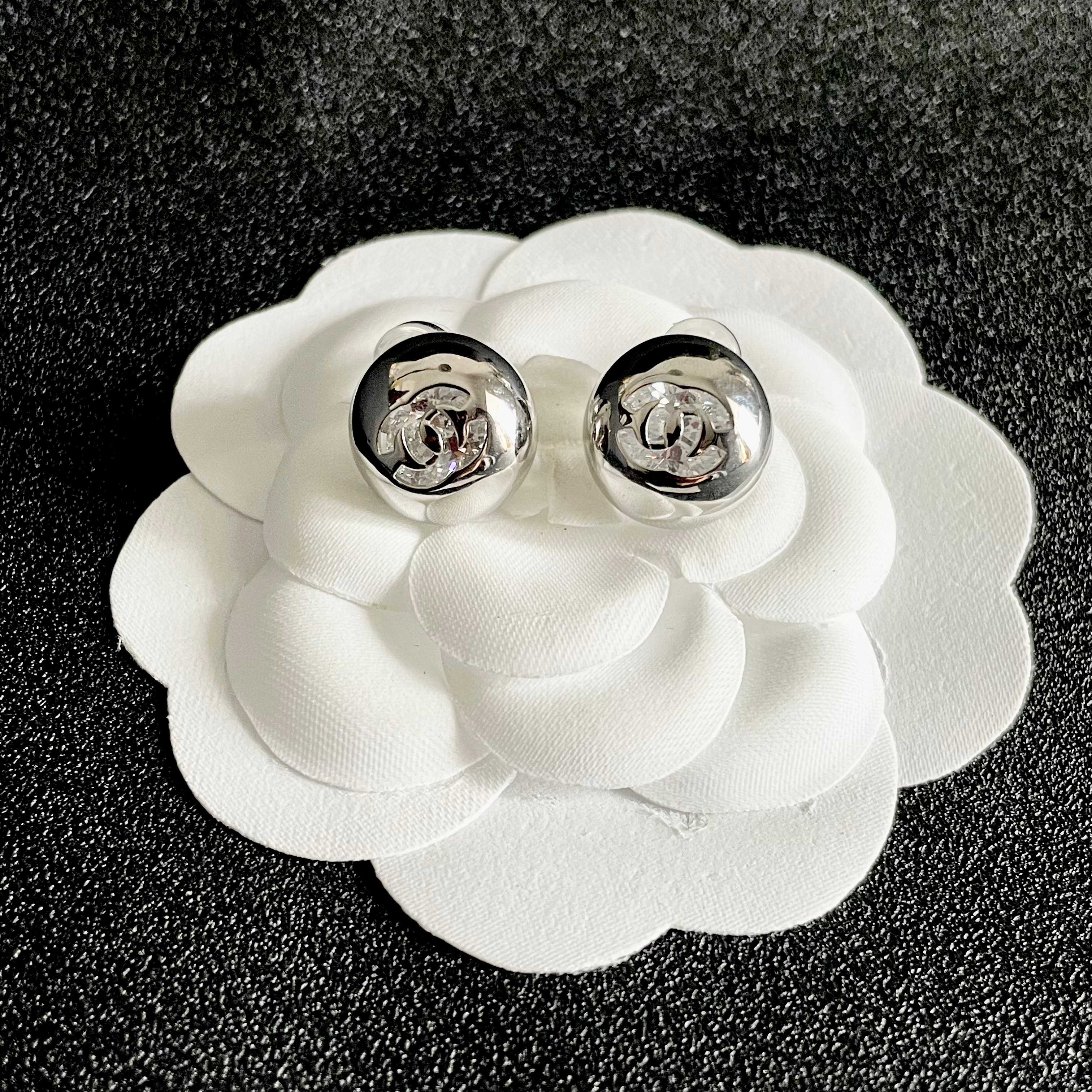 Chanel CC Logo Dome Stud Earrings earrings silver-tone metal with clear crystal accents 12mm diameter
