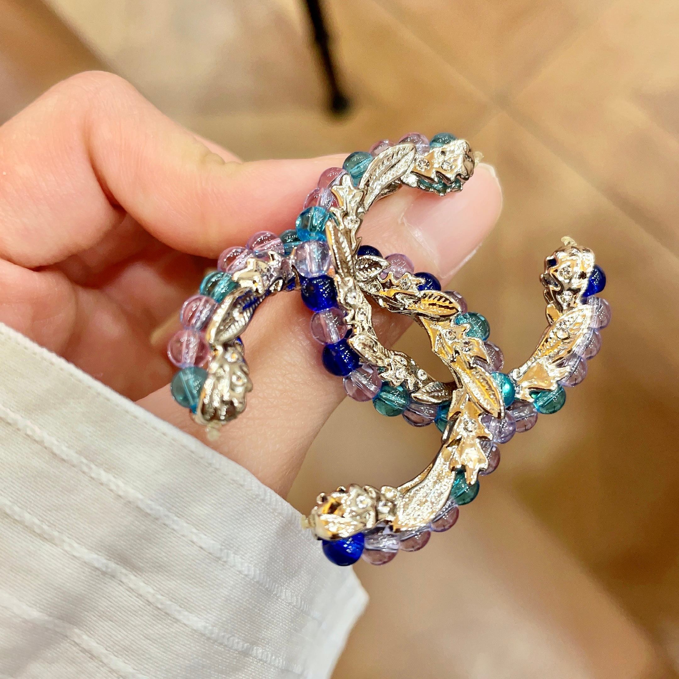 Chanel CC Logo Beaded Brooch brooch gold-tone metal with blue teal purple and pink glass beads 3 5cm width