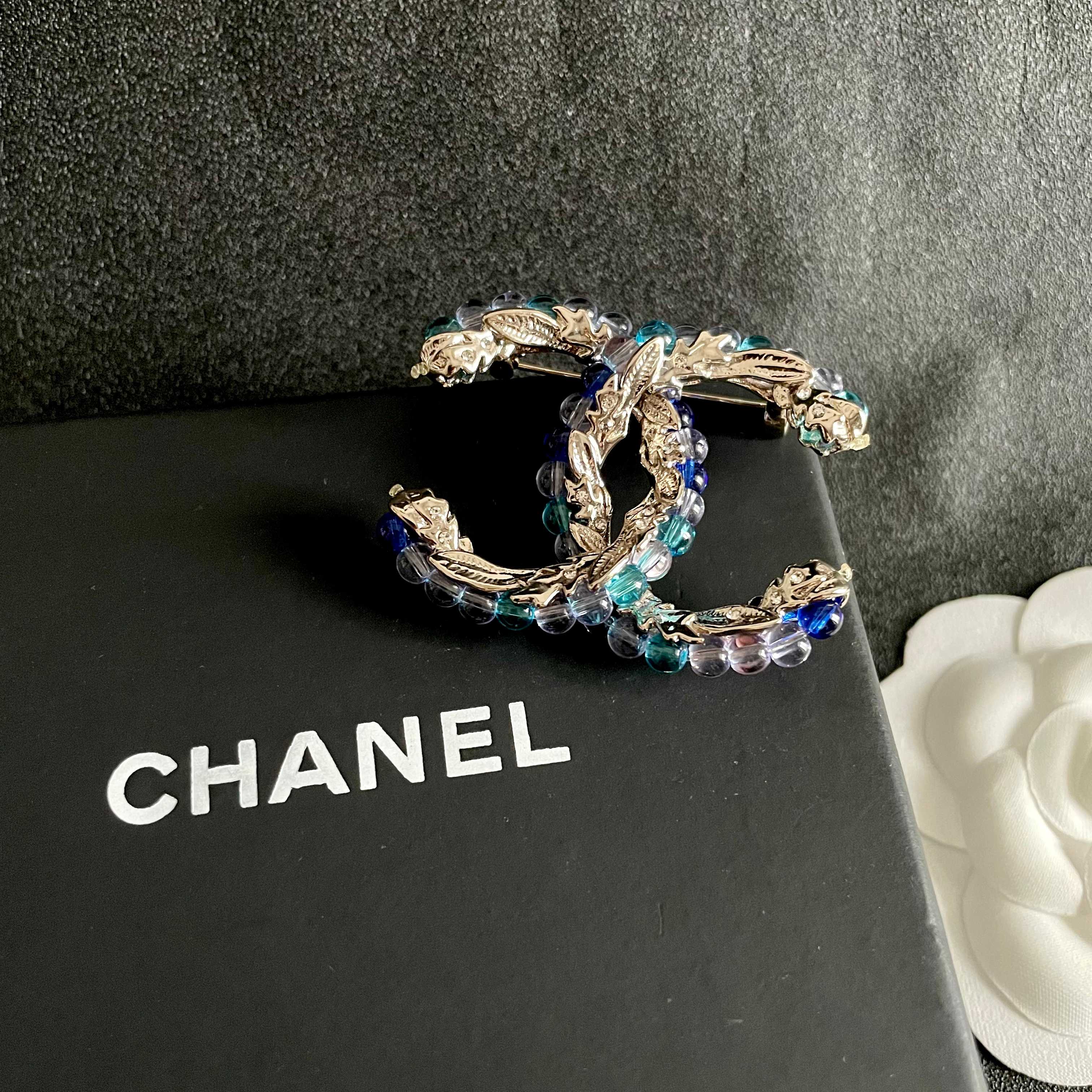 Chanel CC Logo Beaded Brooch brooch gold-tone metal with blue teal purple and pink glass beads 3 5cm width