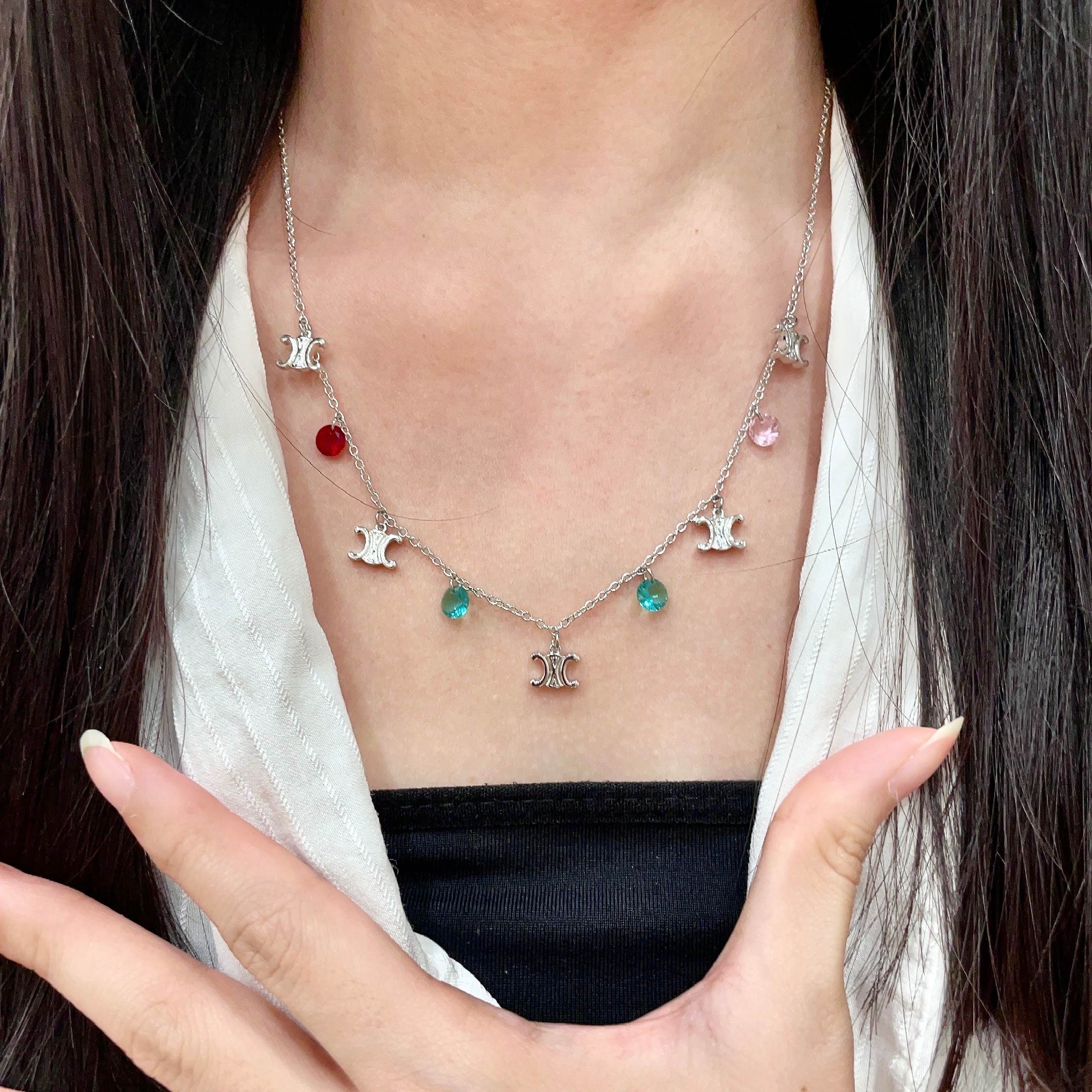 Celine Triomphe Multi Charm necklace Silver-toned metal with red pink teal and green faceted stone charms 40cm