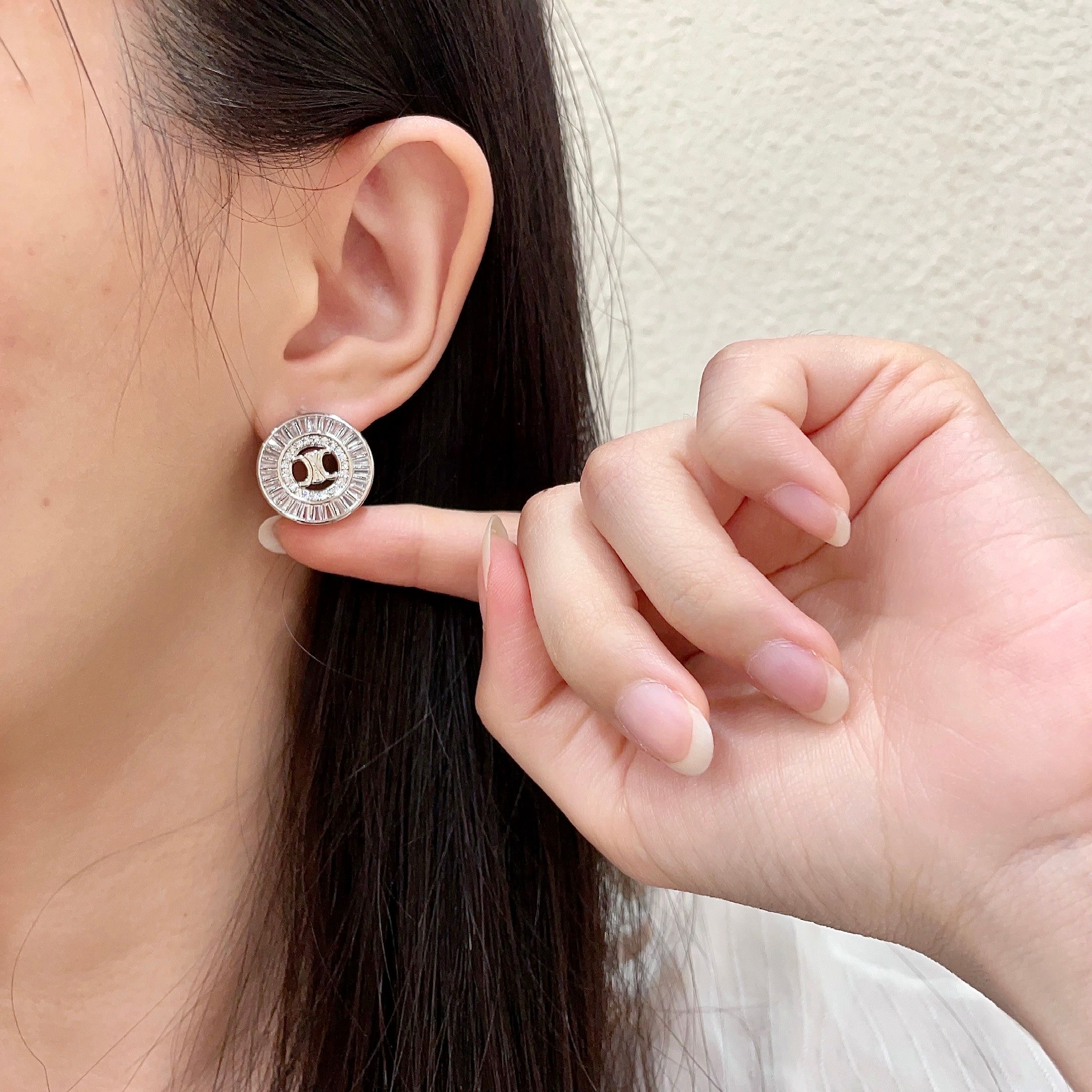 Celine Triomphe Rhinestone Circle Stud Earrings earrings Two variants gold-tone metal with clear baguette-cut crystals silver-tone metal with clear baguette-cut crystals 1 5cm diameter