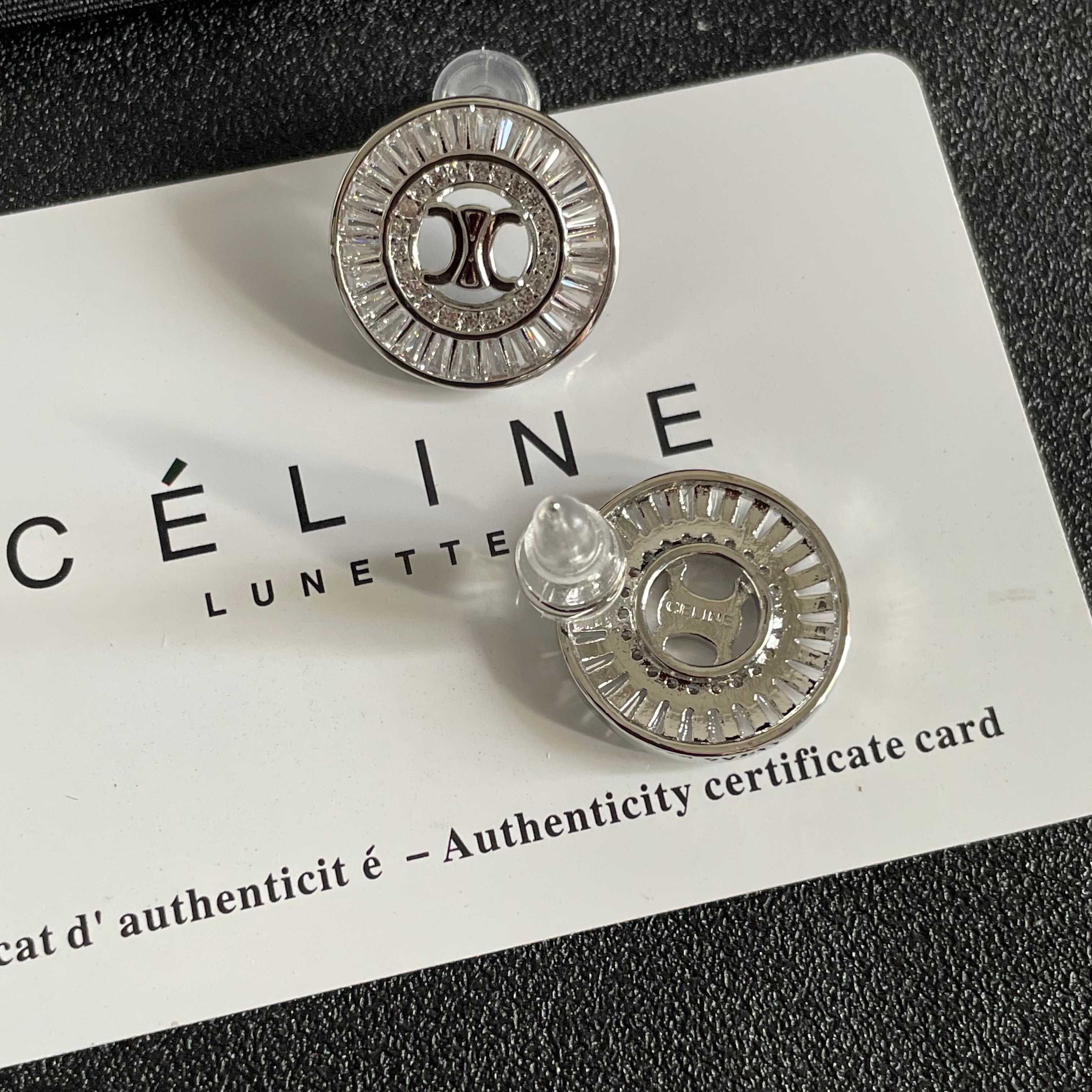 Celine Triomphe Rhinestone Circle Stud Earrings earrings Two variants gold-tone metal with clear baguette-cut crystals silver-tone metal with clear baguette-cut crystals 1 5cm diameter