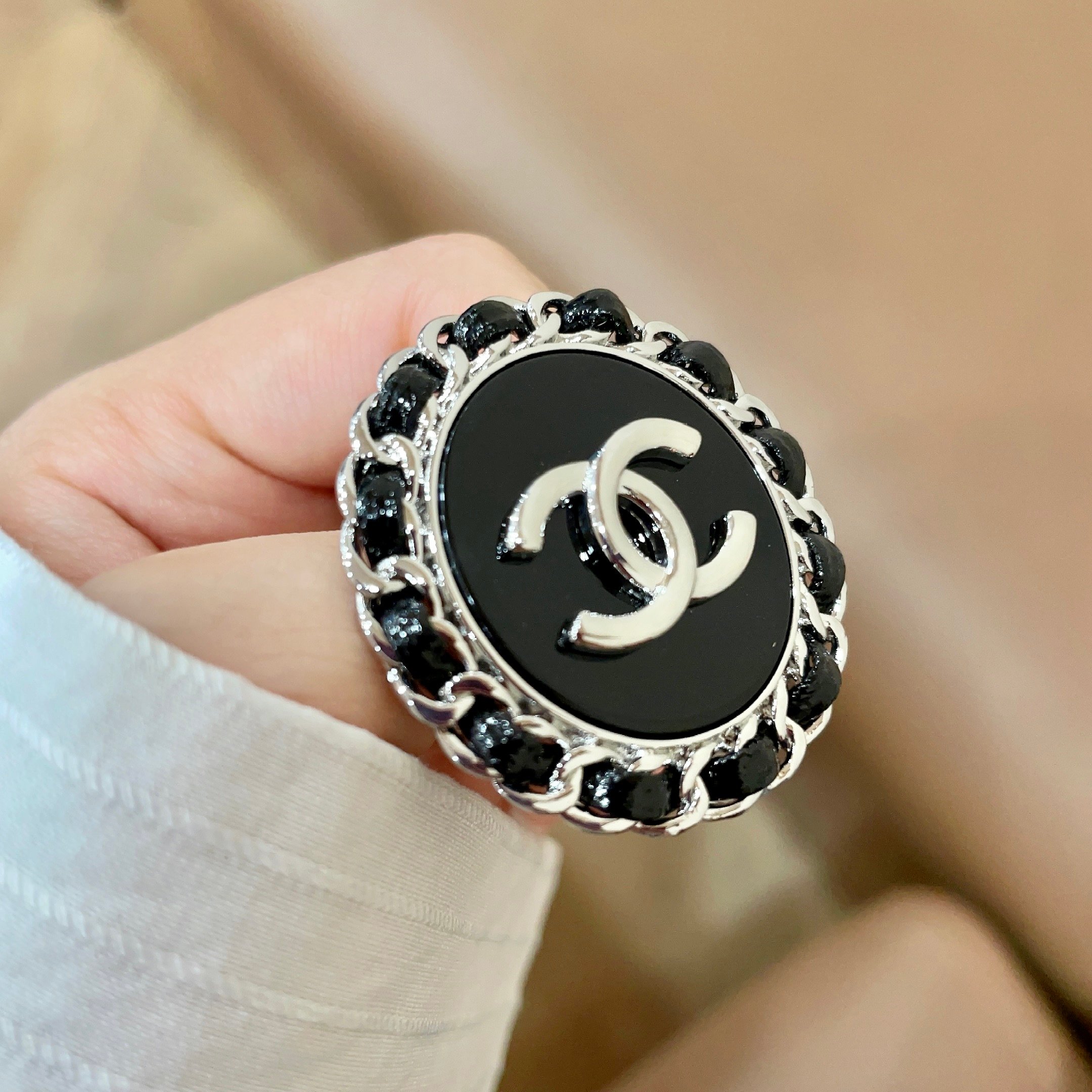 Chanel CC Logo Chain Edge Round brooch silver tone metal black enamel black resin accents 3cm diameter