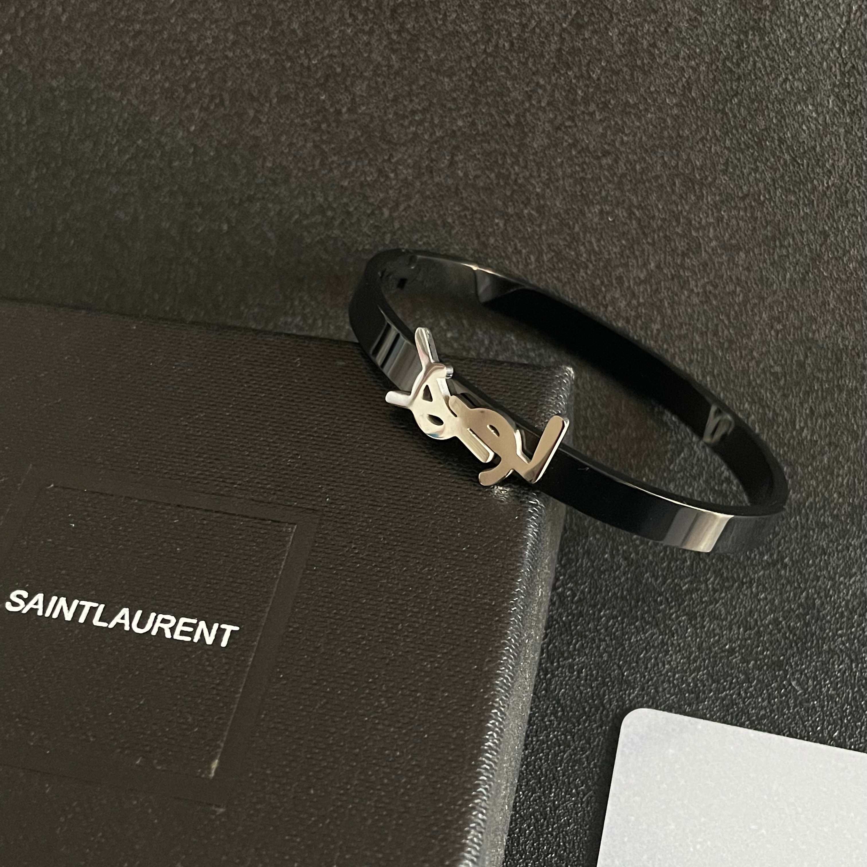 Saint Laurent Cassandre YSL Monogram Bangle bracelet black metal with silver-tone logo 17cm inner circumference