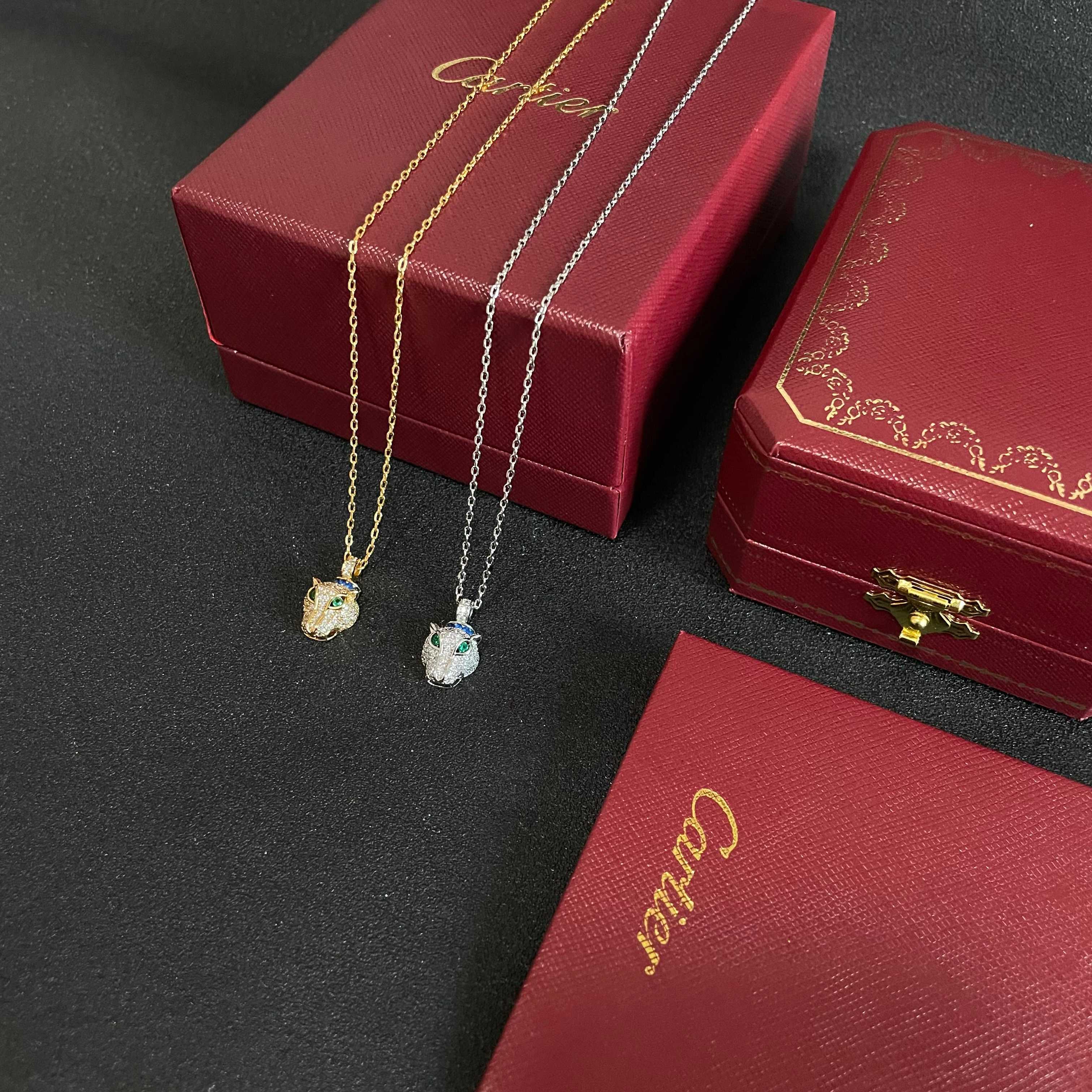 Cartier Panthere de Cartier necklace 18K yellow gold set with pave diamonds green tsavorite garnet eyes blue sapphire accents 40cm