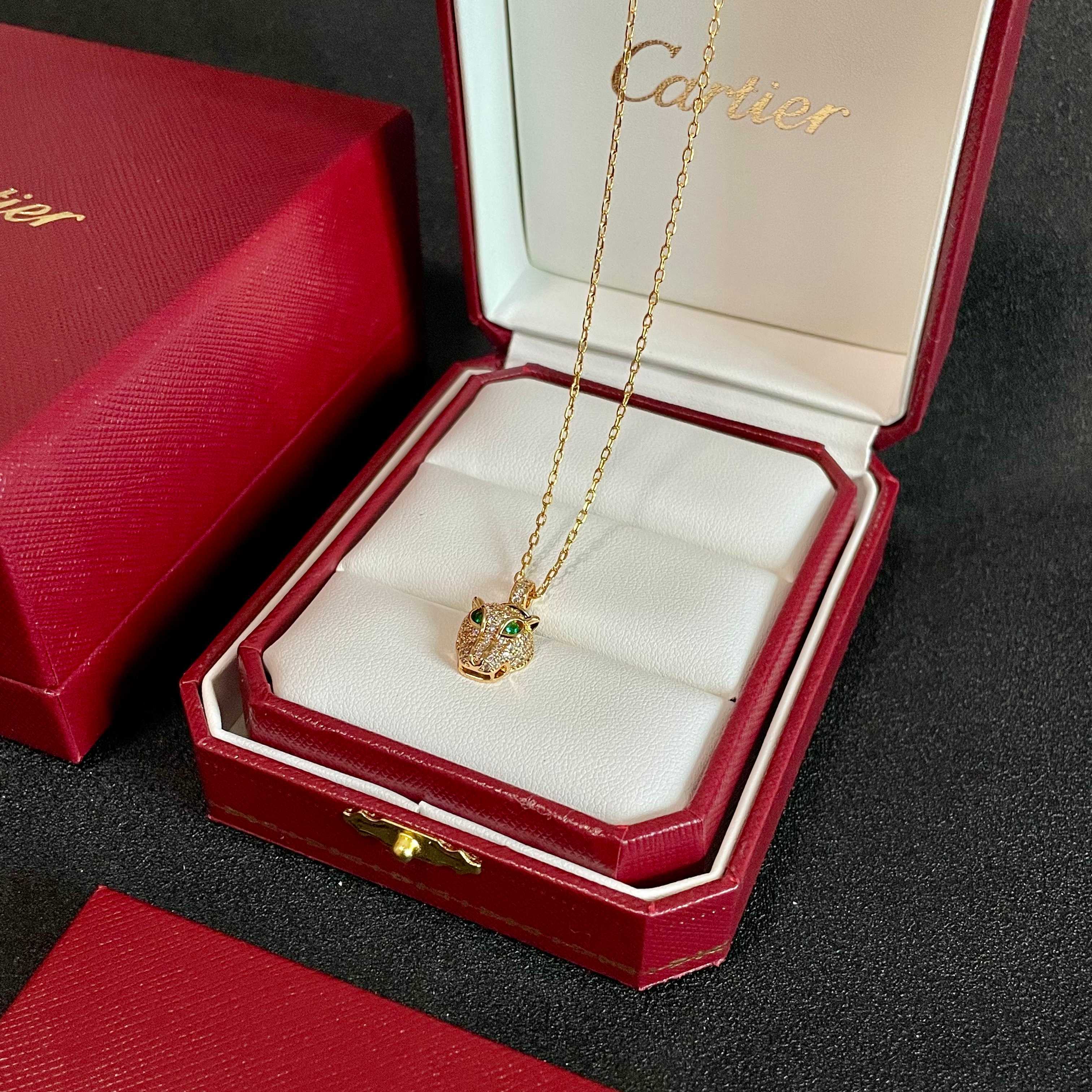 Cartier Panthere de Cartier necklace 18K yellow gold set with pave diamonds green tsavorite garnet eyes blue sapphire accents 40cm
