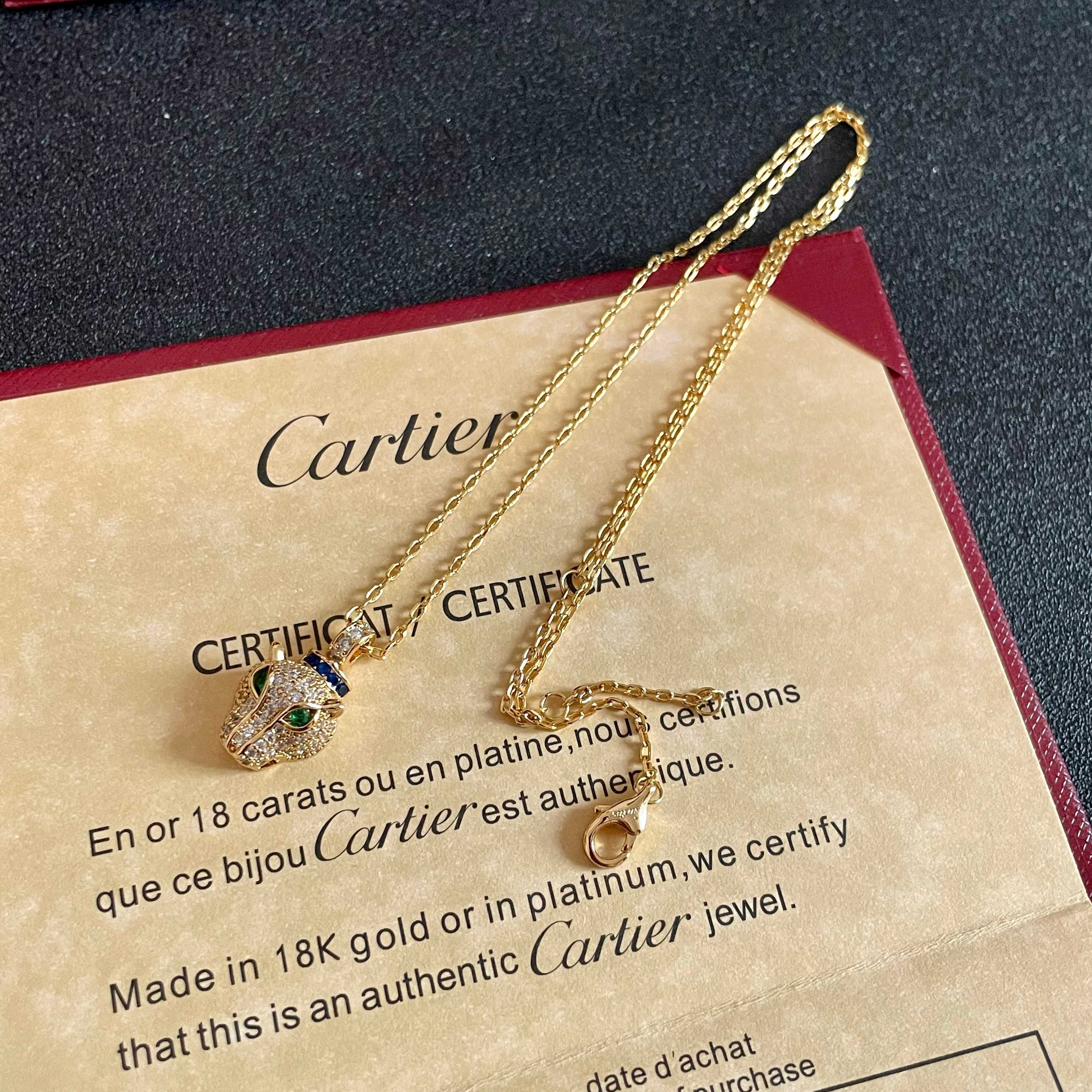 Cartier Panthere de Cartier necklace 18K yellow gold set with pave diamonds green tsavorite garnet eyes blue sapphire accents 40cm