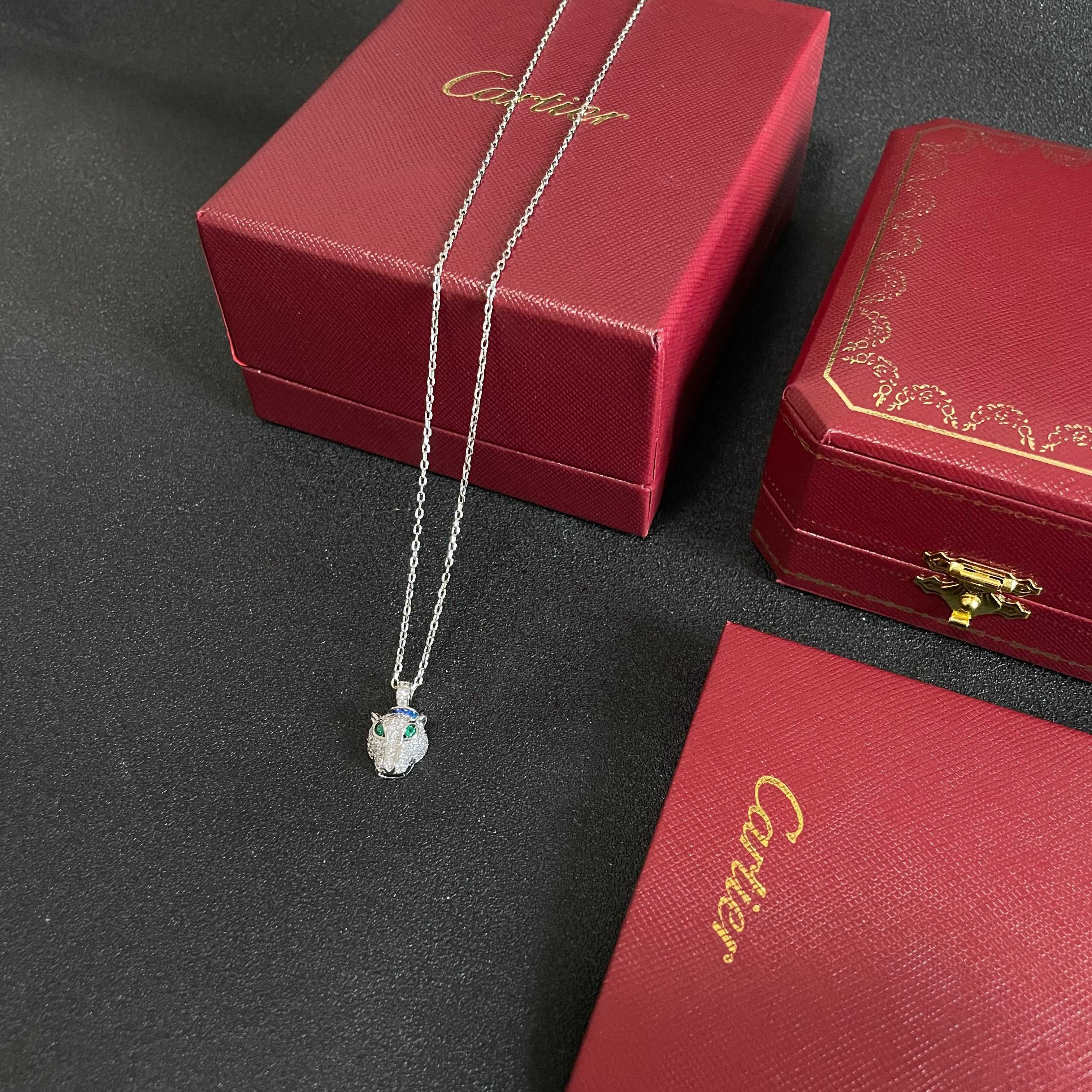 Cartier Panthere de Cartier necklace 18K white gold pave diamonds emerald eyes blue sapphire accent 42cm