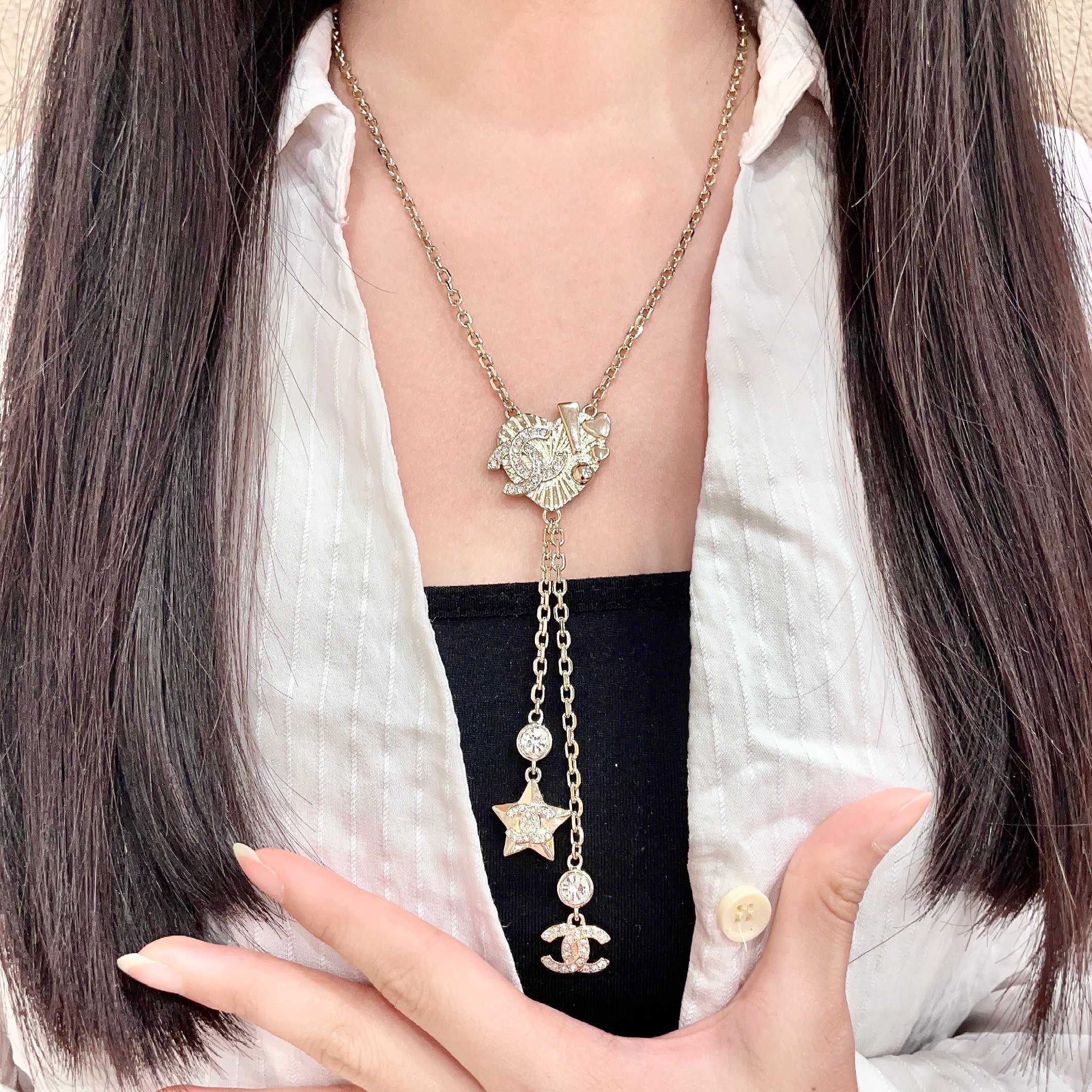 Chanel CC Heart Star Lariat necklace light gold metal with clear crystal accents 42cm