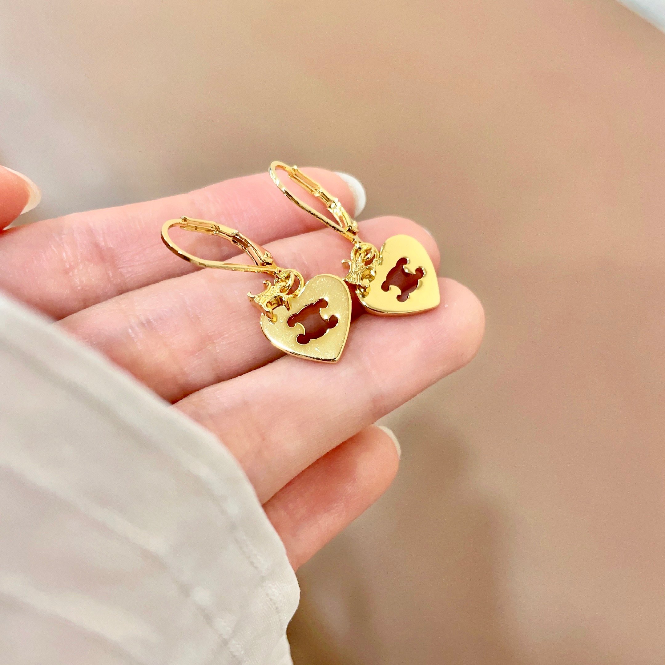 Celine Triomphe Heart Drop Earrings earrings gold-tone metal with enamel accents brown white black 1 5cm drop length