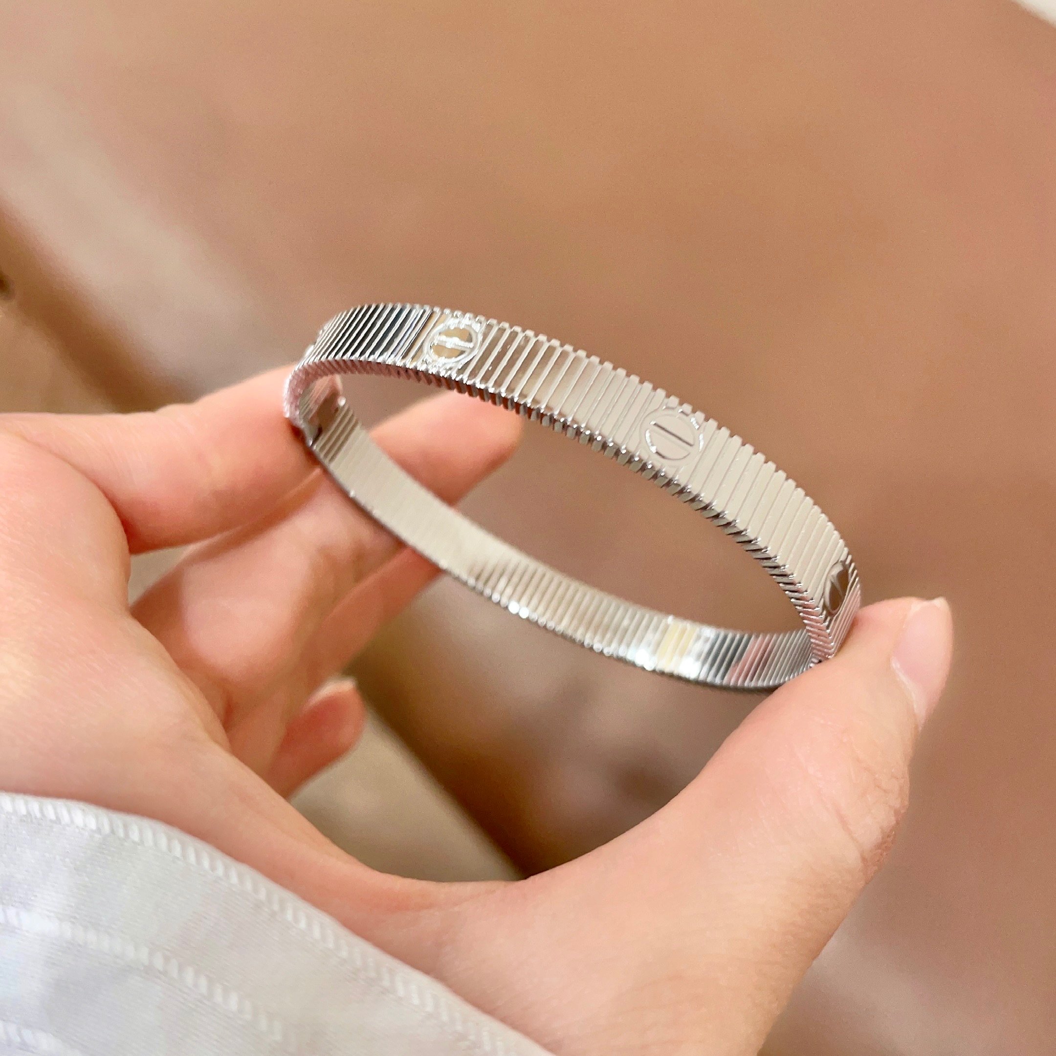 Cartier Love Ribbed Bangle bracelet Silver-toned metal no gemstones 17