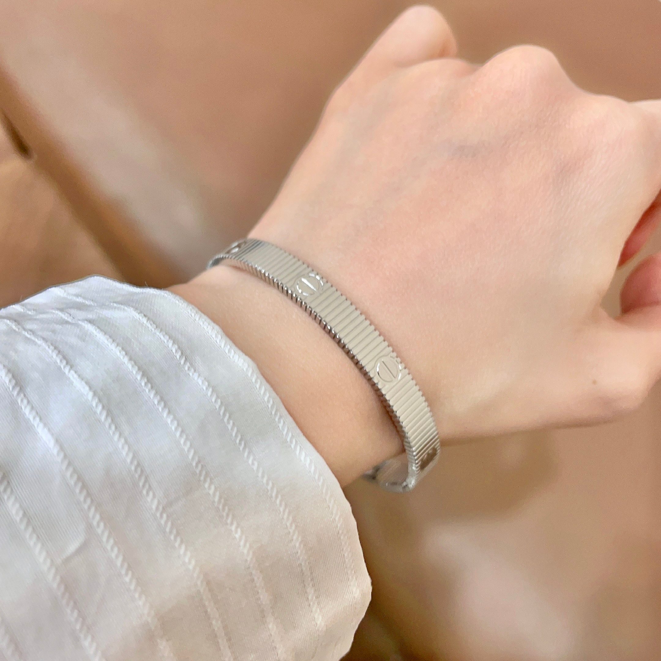 Cartier Love Ribbed Bangle bracelet Silver-toned metal no gemstones 17