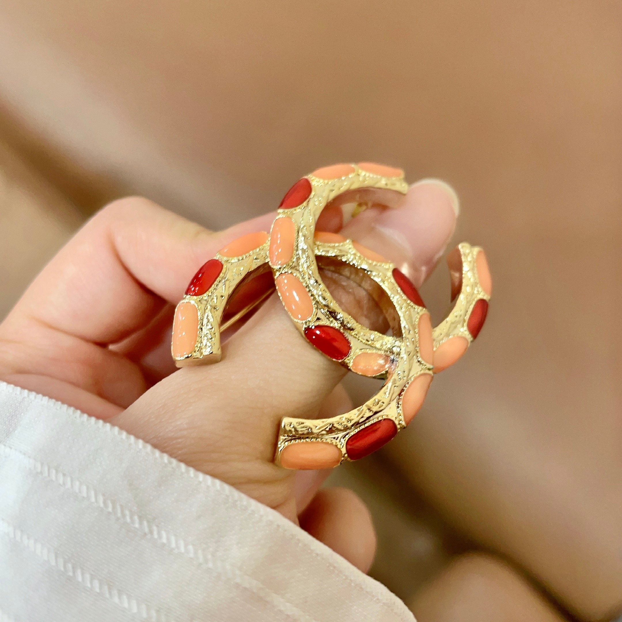 Chanel CC Logo Enamel Brooch brooch gold-tone metal with coral orange and red enamel 3 5cm width