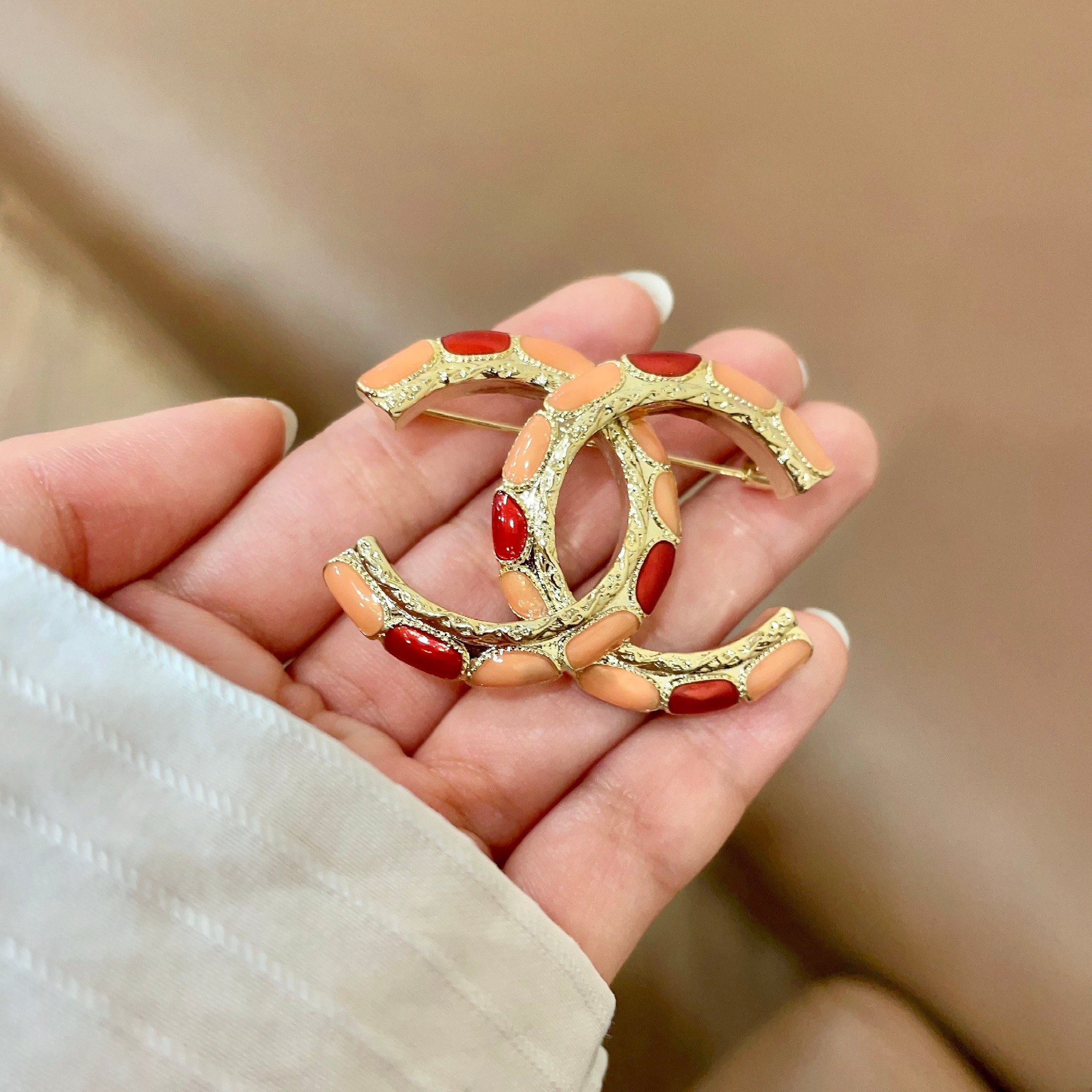 Chanel CC Logo Enamel Brooch brooch gold-tone metal with coral orange and red enamel 3 5cm width