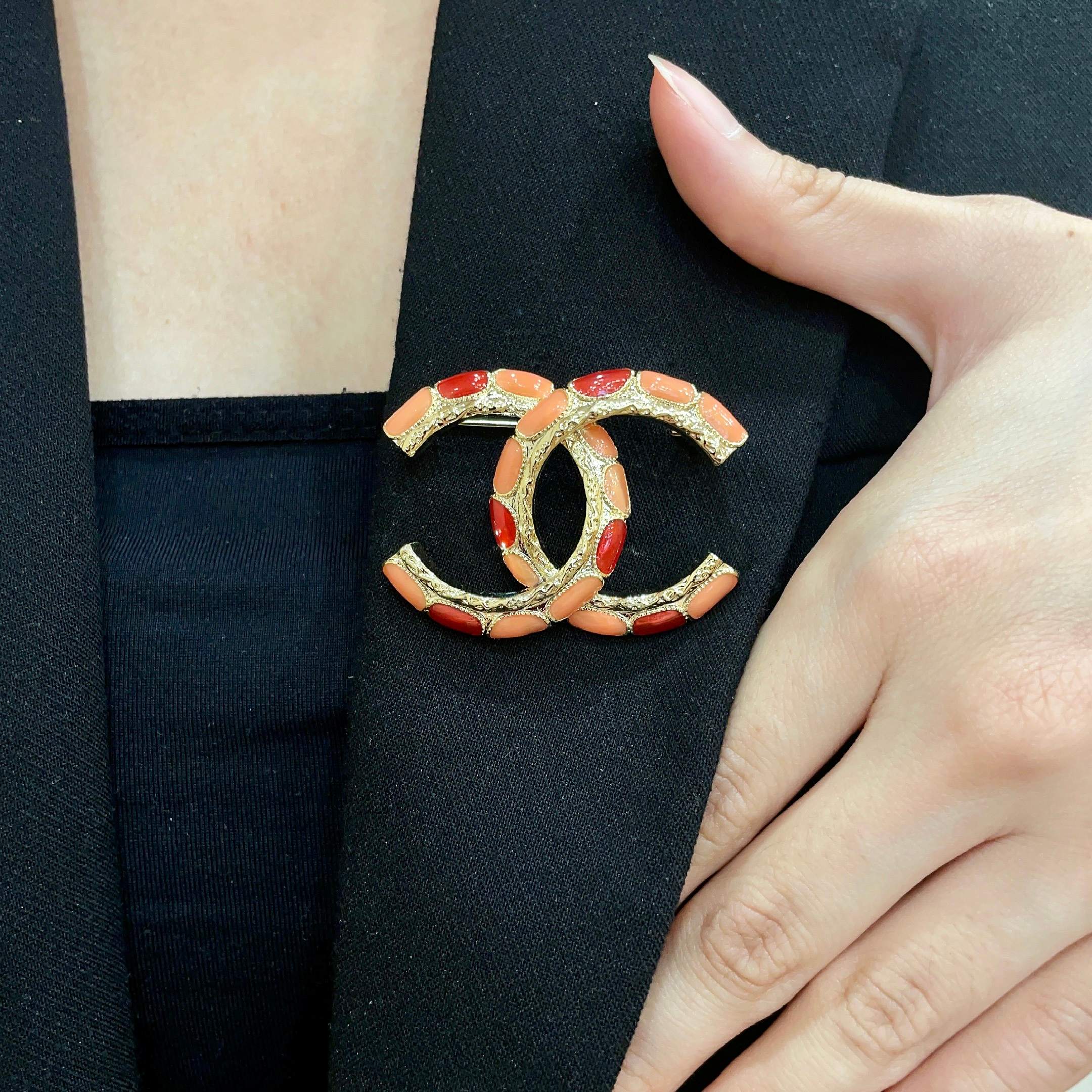 Chanel CC Logo Enamel Brooch brooch gold-tone metal with coral orange and red enamel 3 5cm width