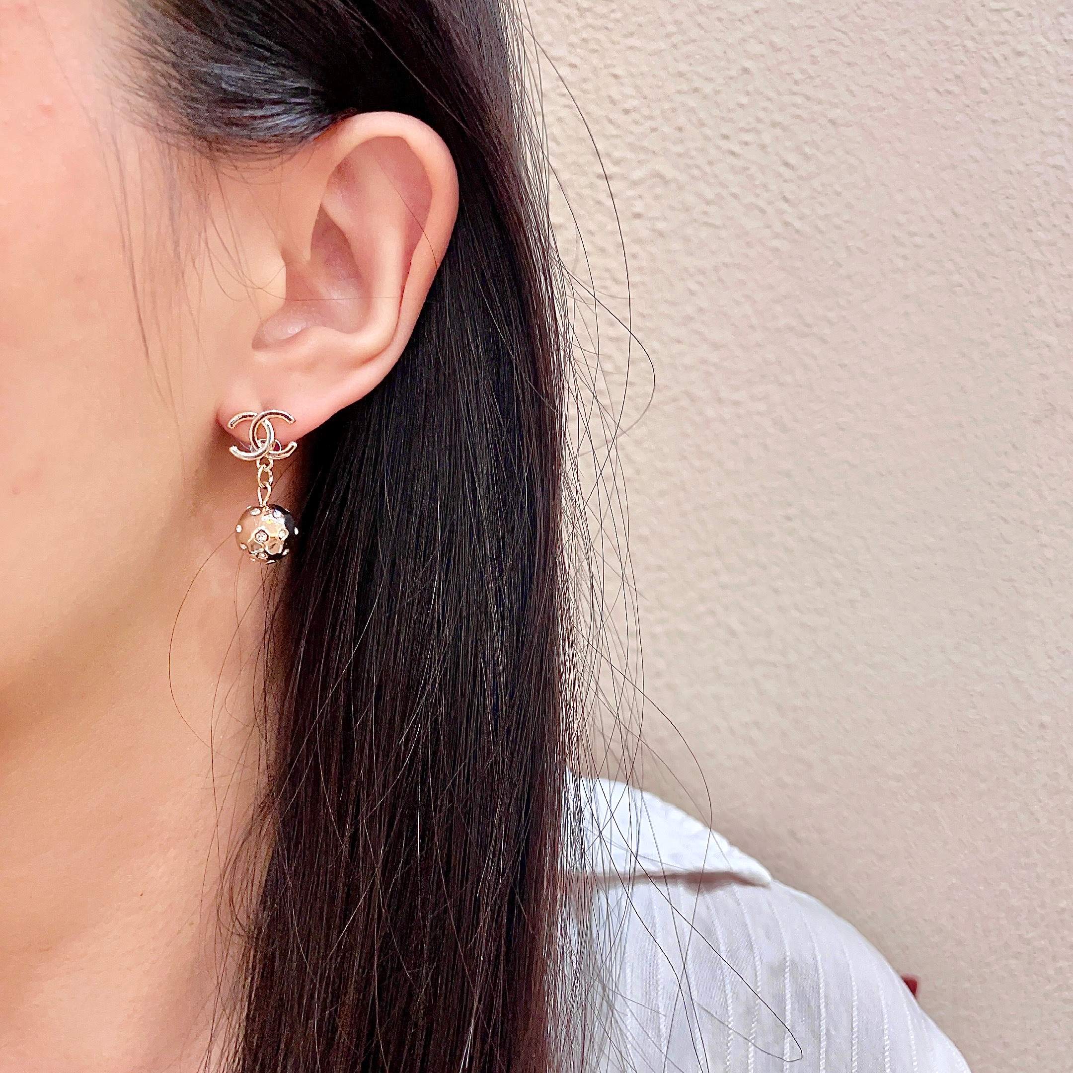 Chanel CC Logo Hammered Crystal Ball Drop Earrings earrings Light gold-tone metal with clear faceted crystal accents Approximately 2cm total drop length