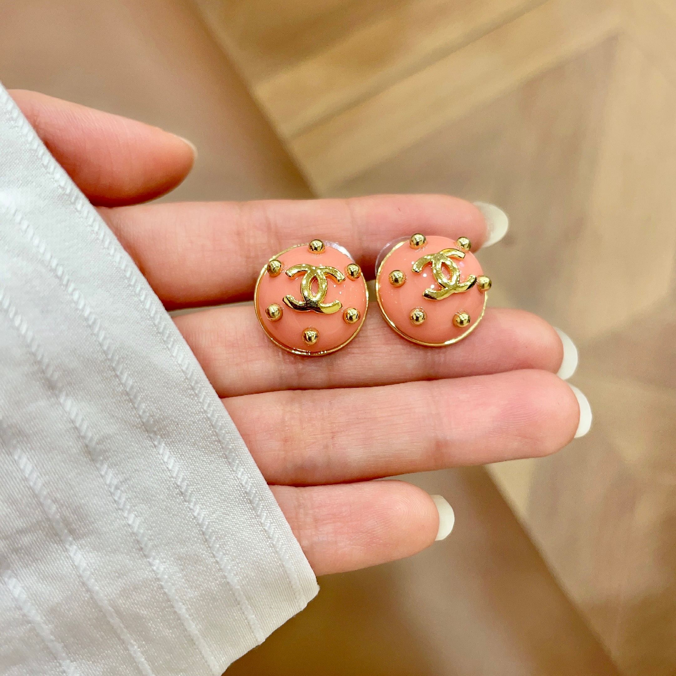 Chanel CC Logo Stud Earrings earrings Gold-tone metal with coral pink enamel 1 5cm diameter