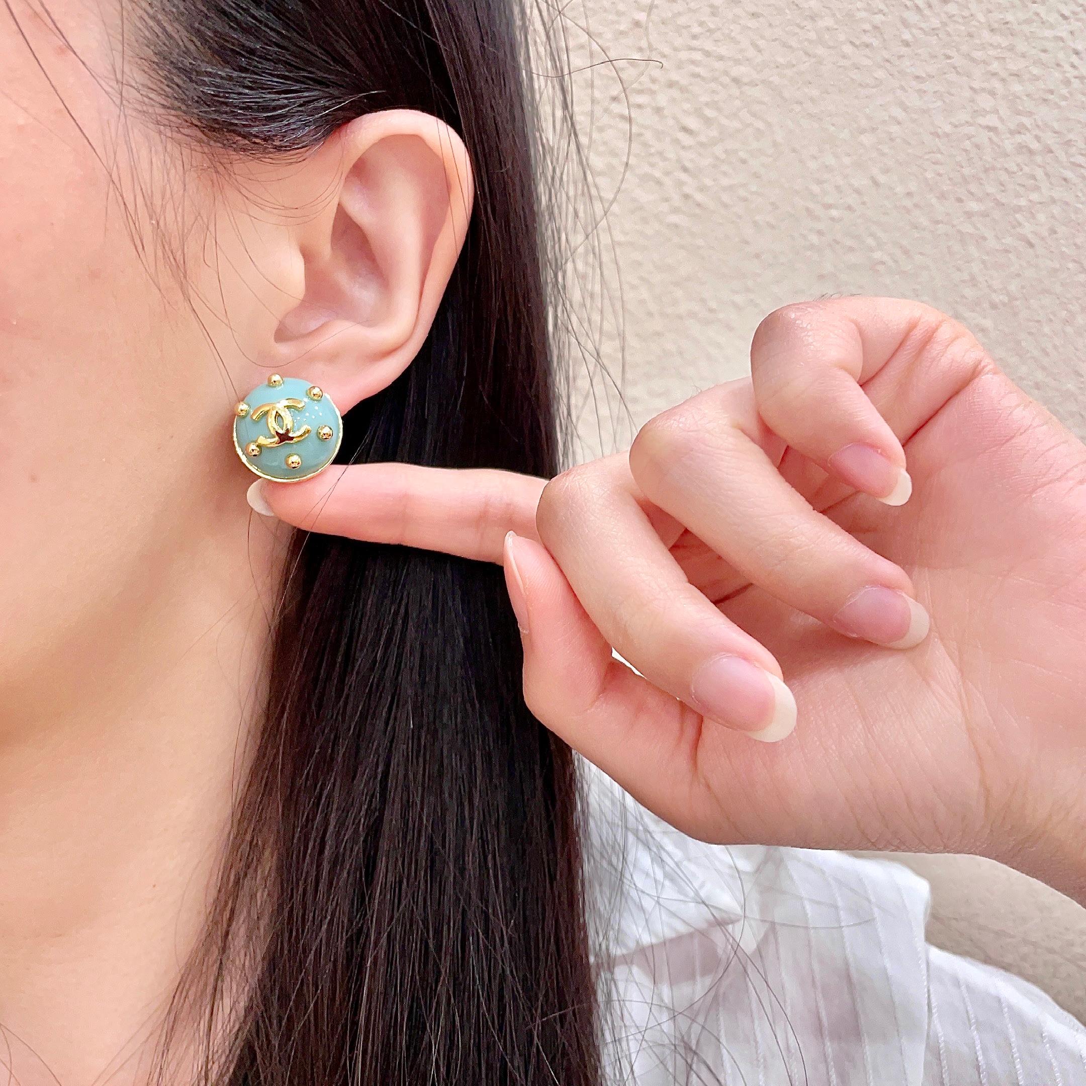 Chanel CC Logo Stud Earrings earrings Gold-tone metal with light turquoise enamel 1 5cm diameter