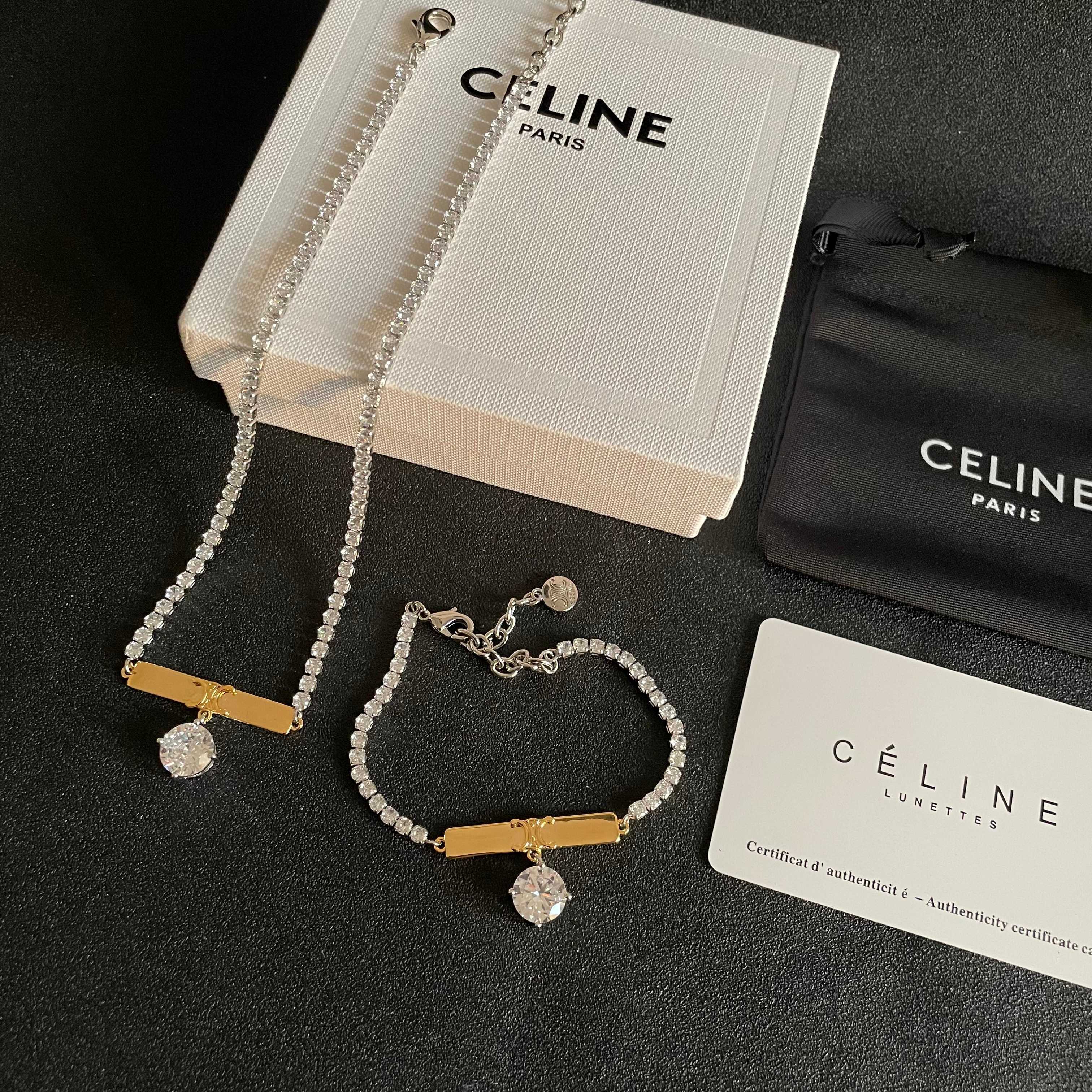 Celine Triomphe Crystal Charm Bracelet bracelet Two-tone gold and silver metal with clear faceted crystal stones 16cm with 5cm extender chain