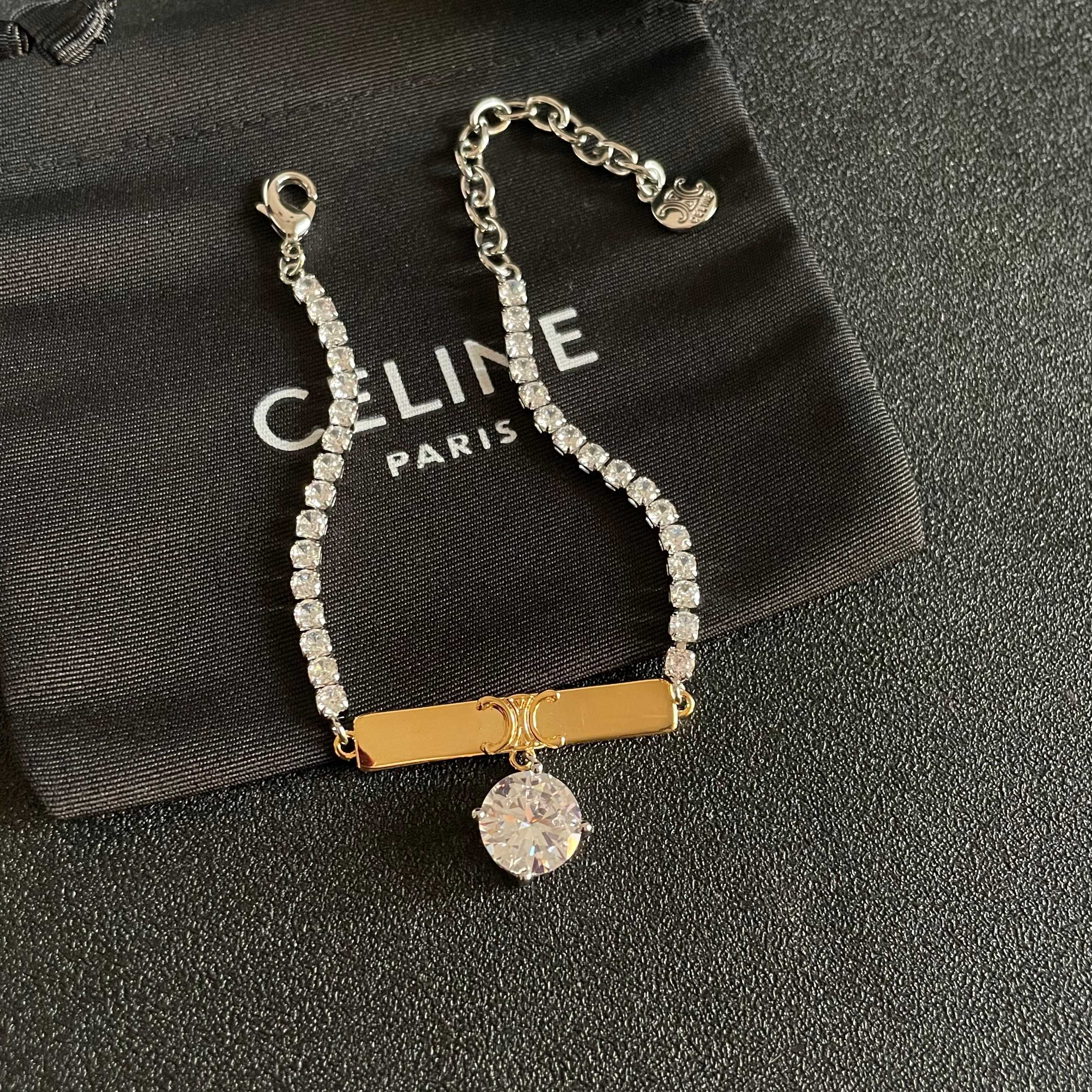 Celine Triomphe Crystal Charm Bracelet bracelet Two-tone gold and silver metal with clear faceted crystal stones 16cm with 5cm extender chain