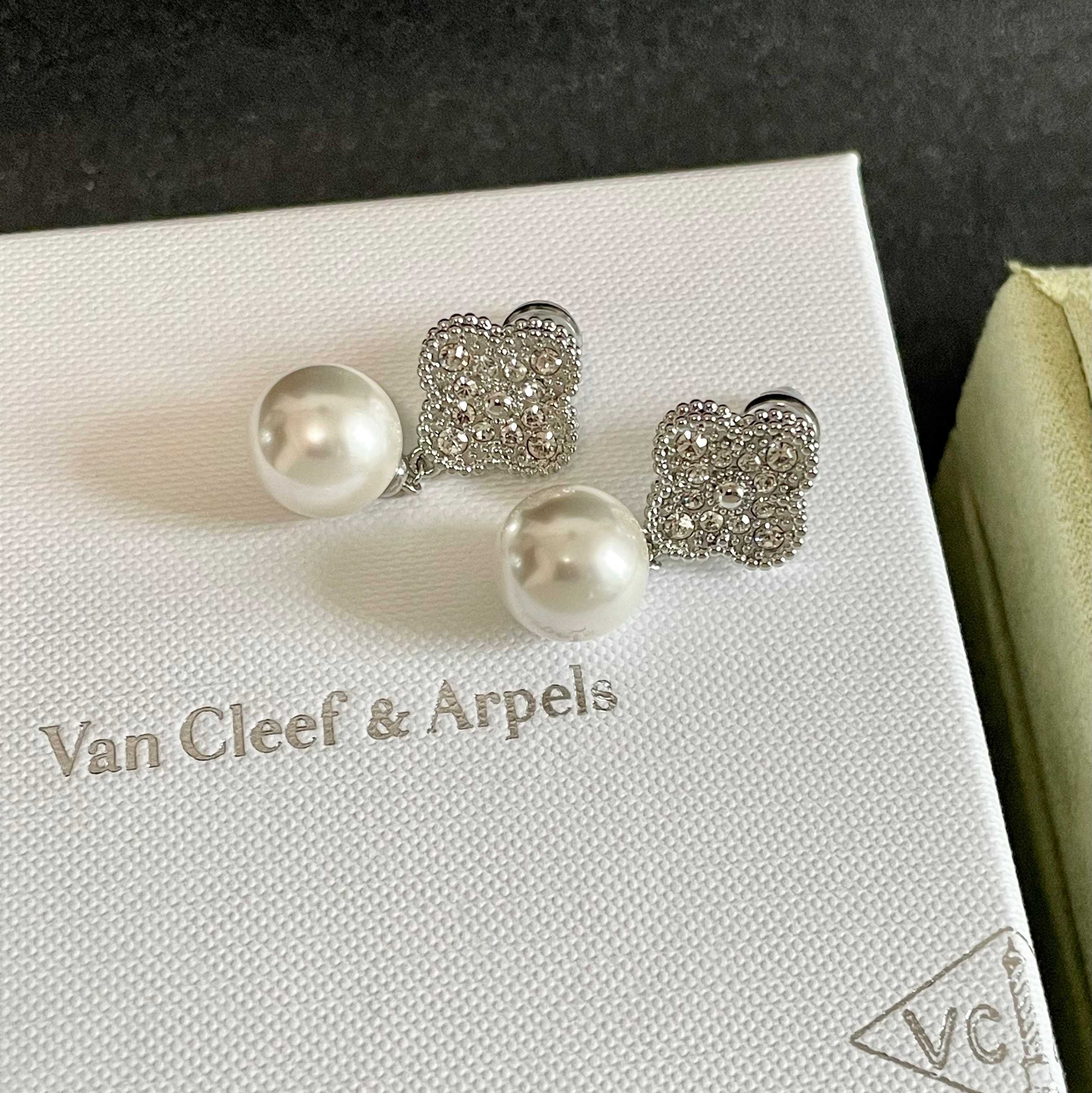 Van Cleef Arpels Magic Alhambra earrings white gold metal with clear diamond pave and white cultured pearl 2 5cm drop length