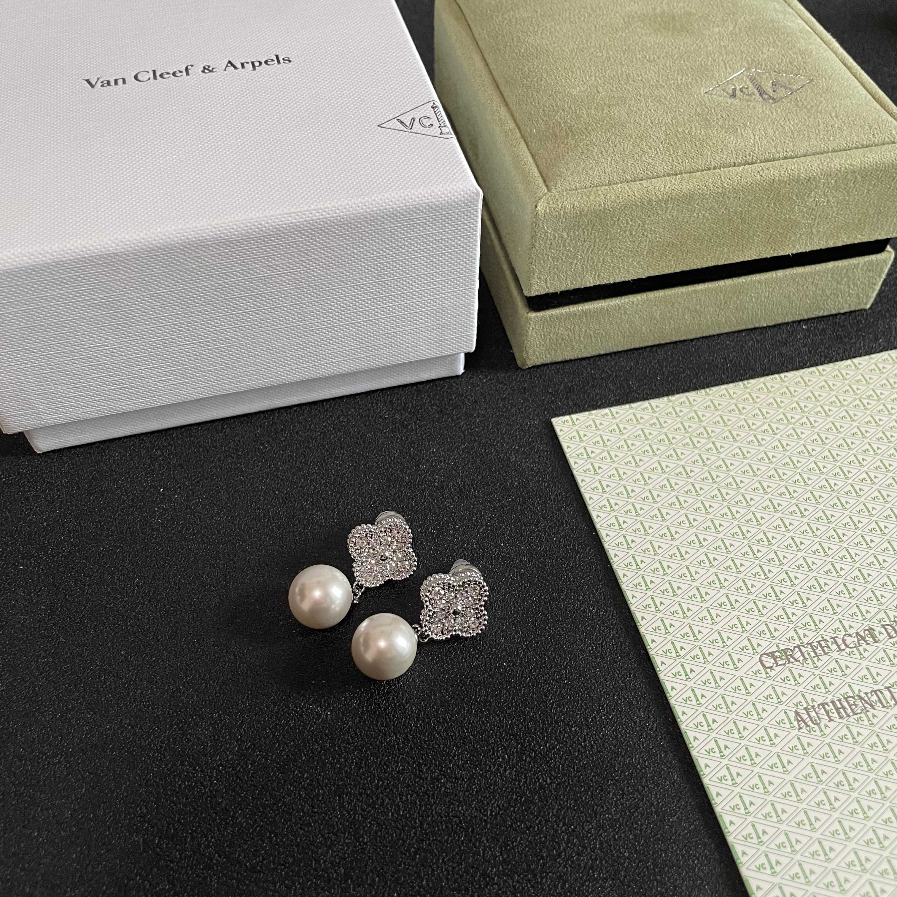 Van Cleef Arpels Magic Alhambra earrings white gold metal with clear diamond pave and white cultured pearl 2 5cm drop length