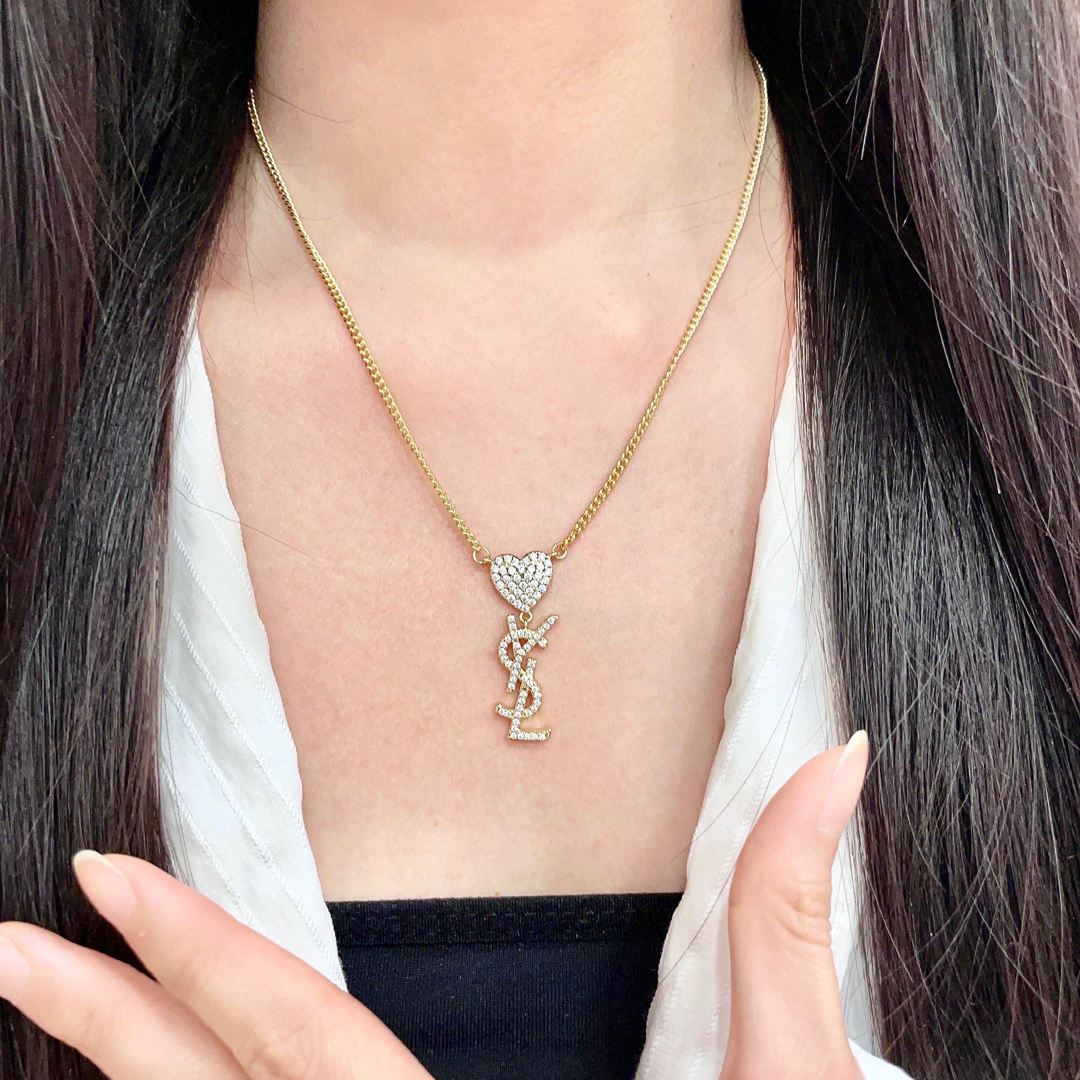 Saint Laurent 1961 Heart Monogram Pendant necklace Gold-tone metal with clear pave crystals 45cm