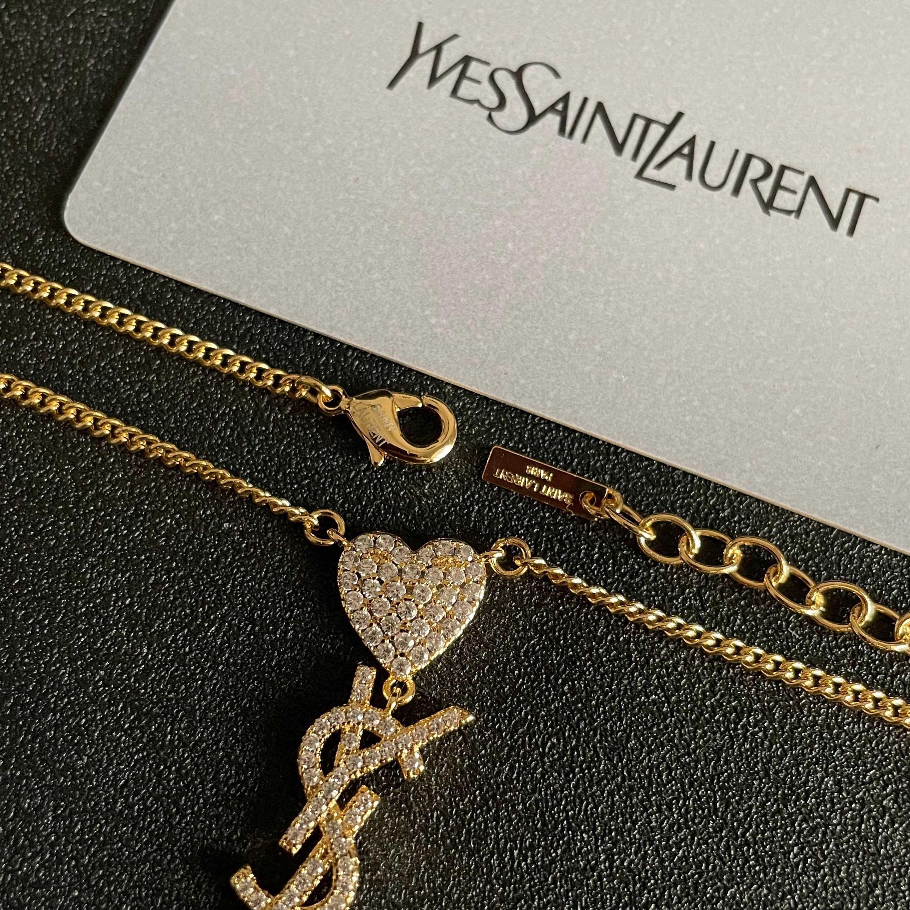 Saint Laurent 1961 Heart Monogram Pendant necklace Gold-tone metal with clear pave crystals 45cm