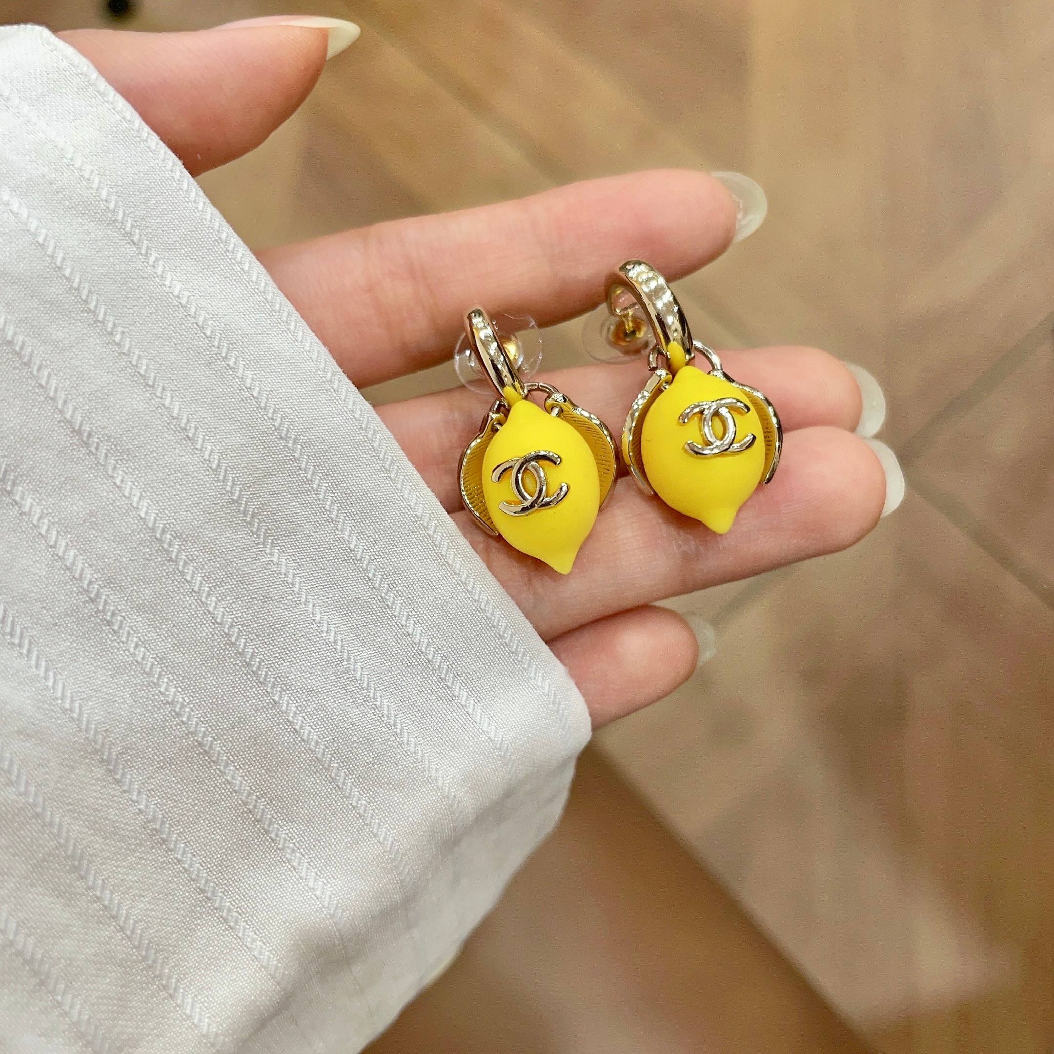 Chanel CC Lemon Drop Earrings earrings Gold-tone metal with bright yellow lemon resin accents One Size drop length approx 2 5cm