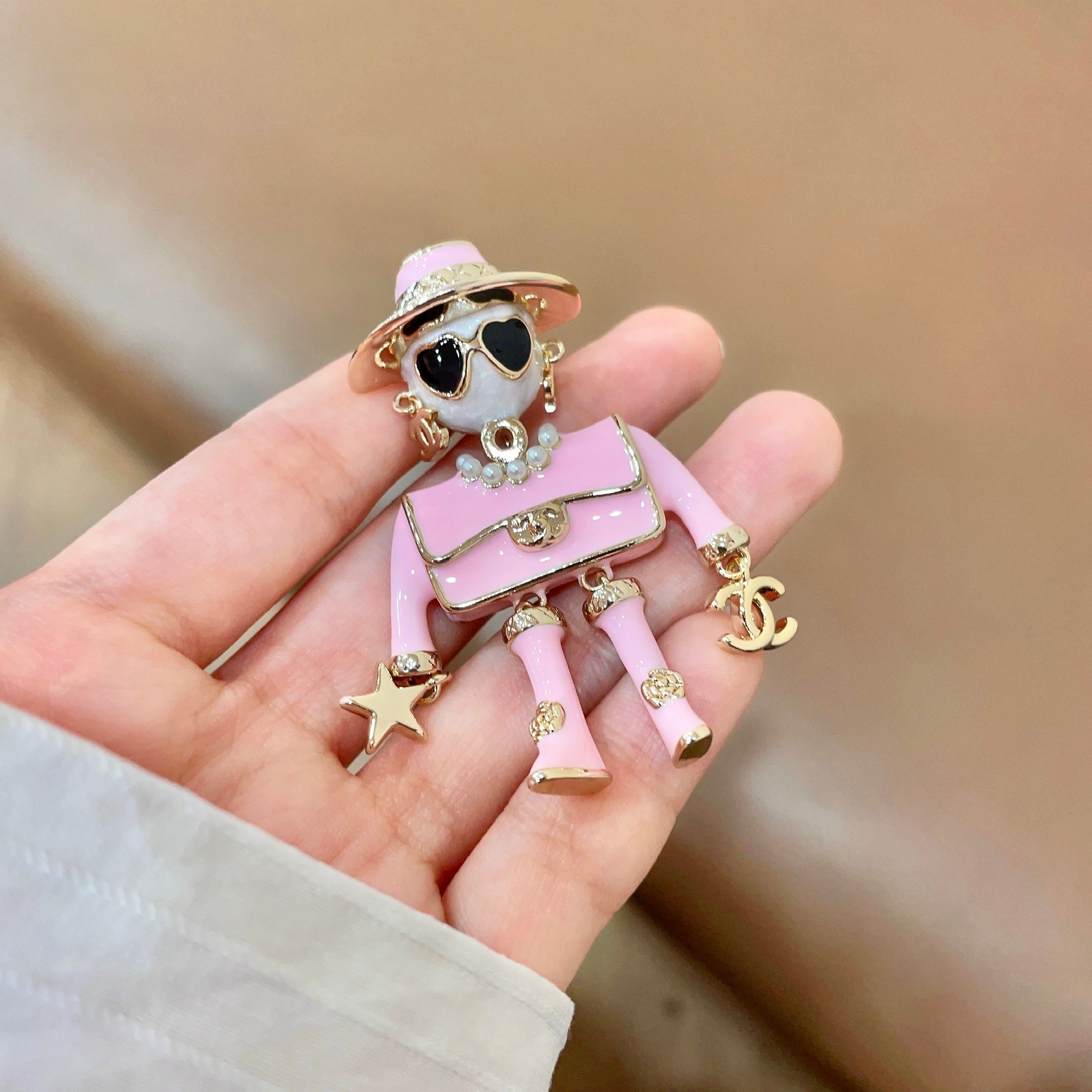 Chanel Coco Doll Brooch brooch gold-tone metal pink enamel white faux pearl black enamel clear crystal 4 5cm