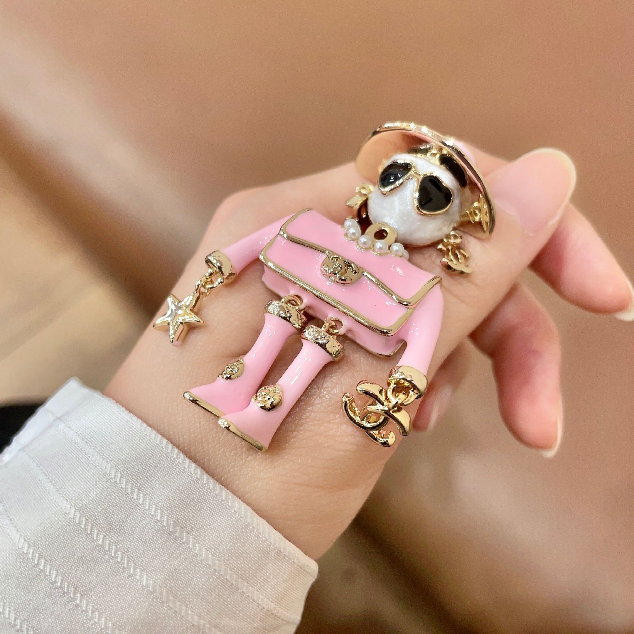 Chanel Coco Doll Brooch brooch gold-tone metal pink enamel white faux pearl black enamel clear crystal 4 5cm