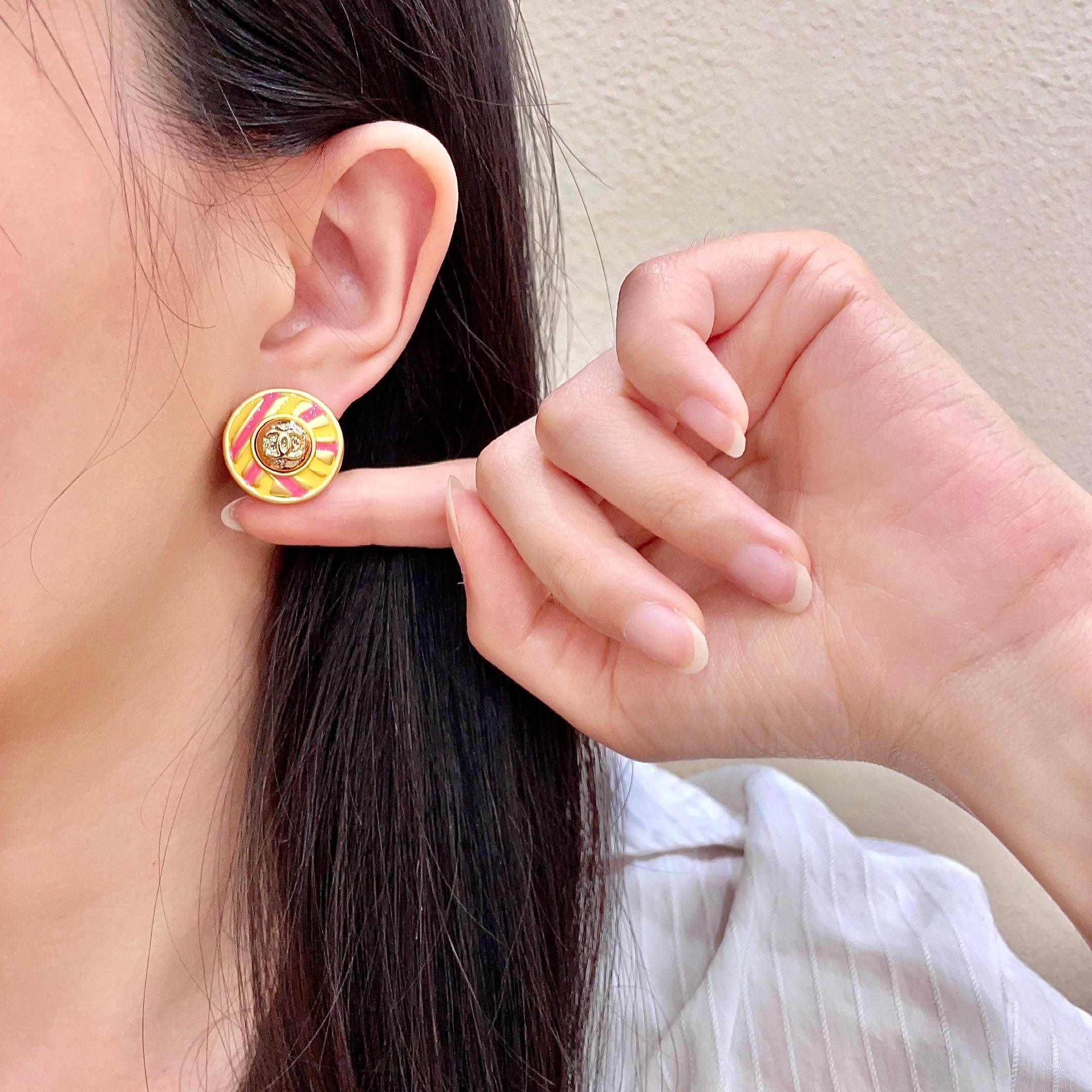 Chanel CC Logo Candy Stripe Button Stud Earrings earrings Gold-tone metal with yellow and pink enamel 1 8cm diameter