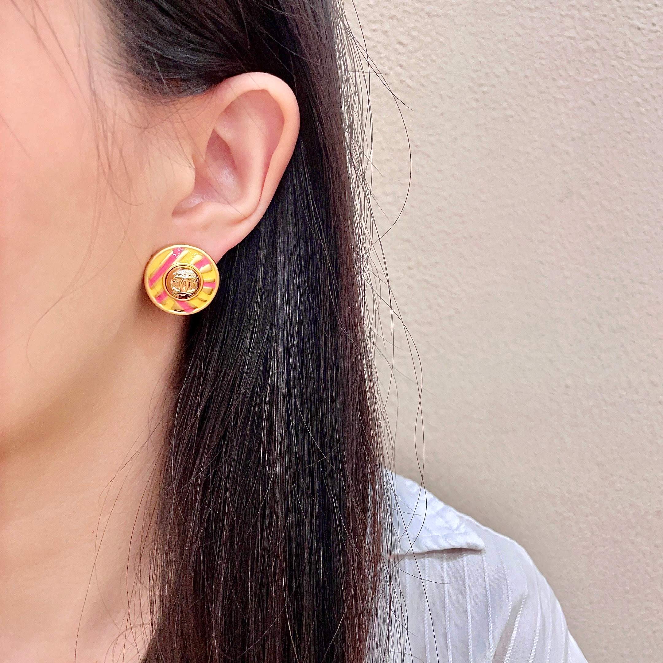 Chanel CC Logo Candy Stripe Button Stud Earrings earrings Gold-tone metal with yellow and pink enamel 1 8cm diameter