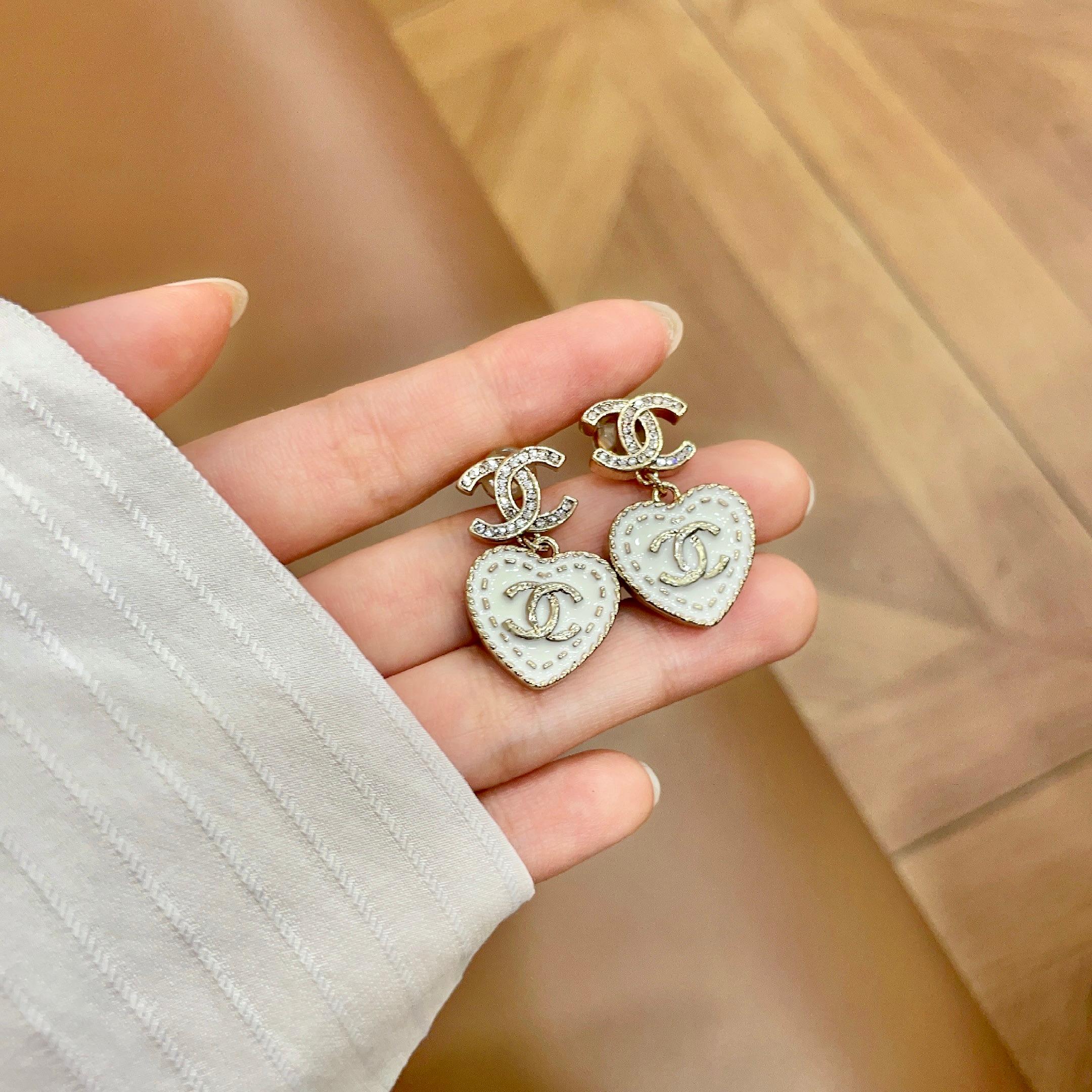 Chanel CC Heart Drop Earrings earrings light gold tone metal clear crystal white enamel 2 5cm drop length