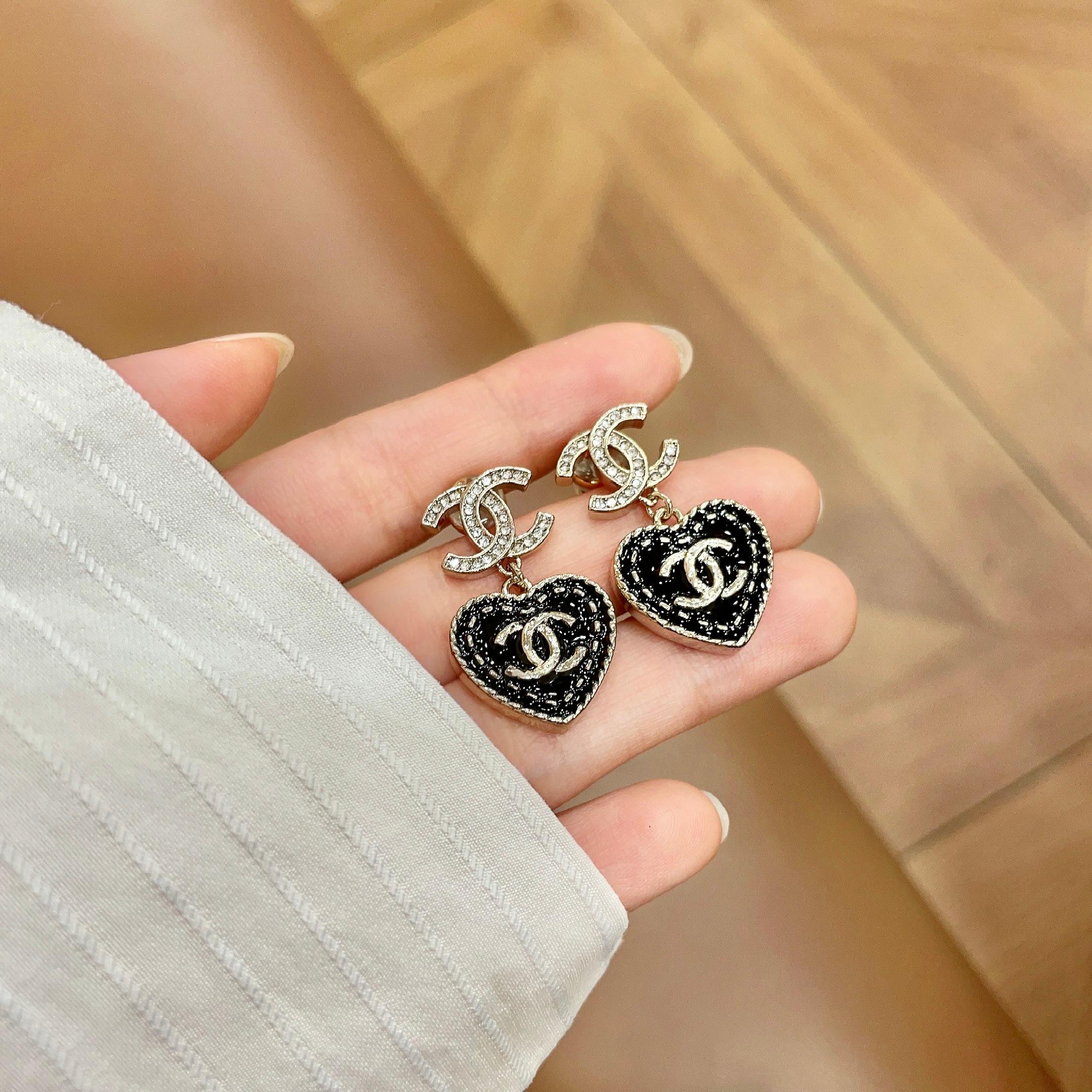 Chanel CC Heart Drop Earrings earrings Gold-tone metal with black enamel and clear crystal accents 2 5cm drop length