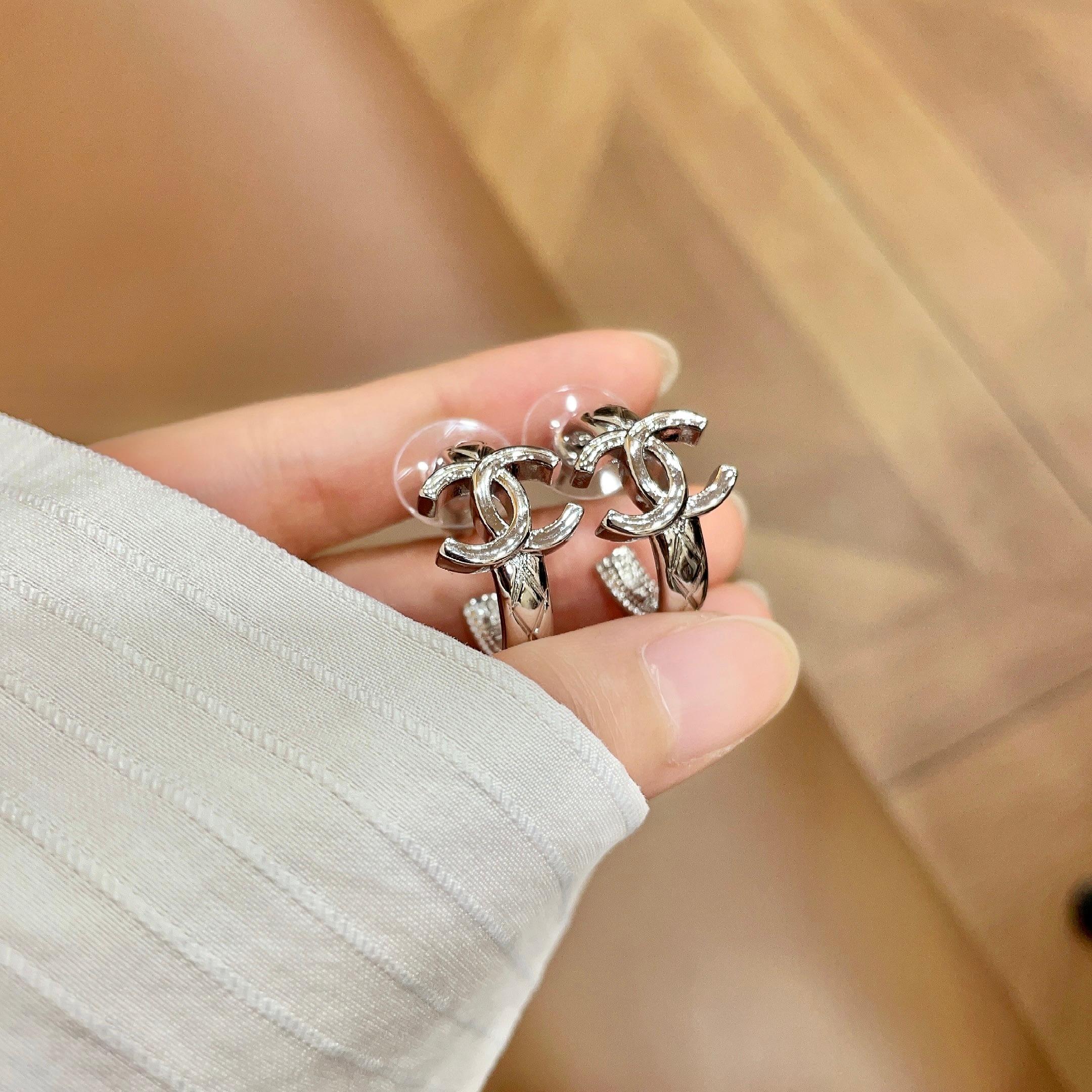 Chanel CC Logo Crystal Hoop Earrings earrings silver-toned metal with clear crystal accents 1 5cm diameter