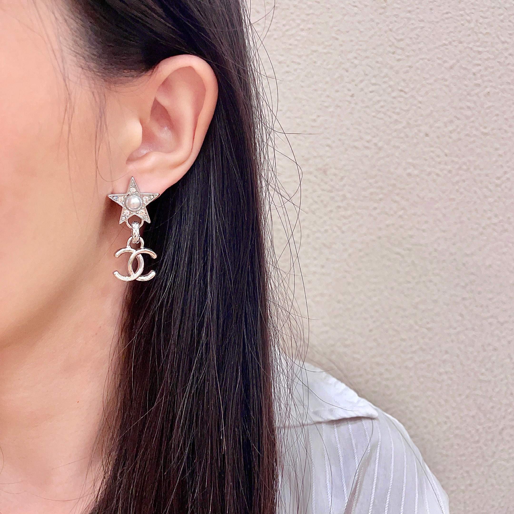 Chanel CC Star Drop Earrings earrings Silver-tone metal with clear crystals and white pearl accents One Size
