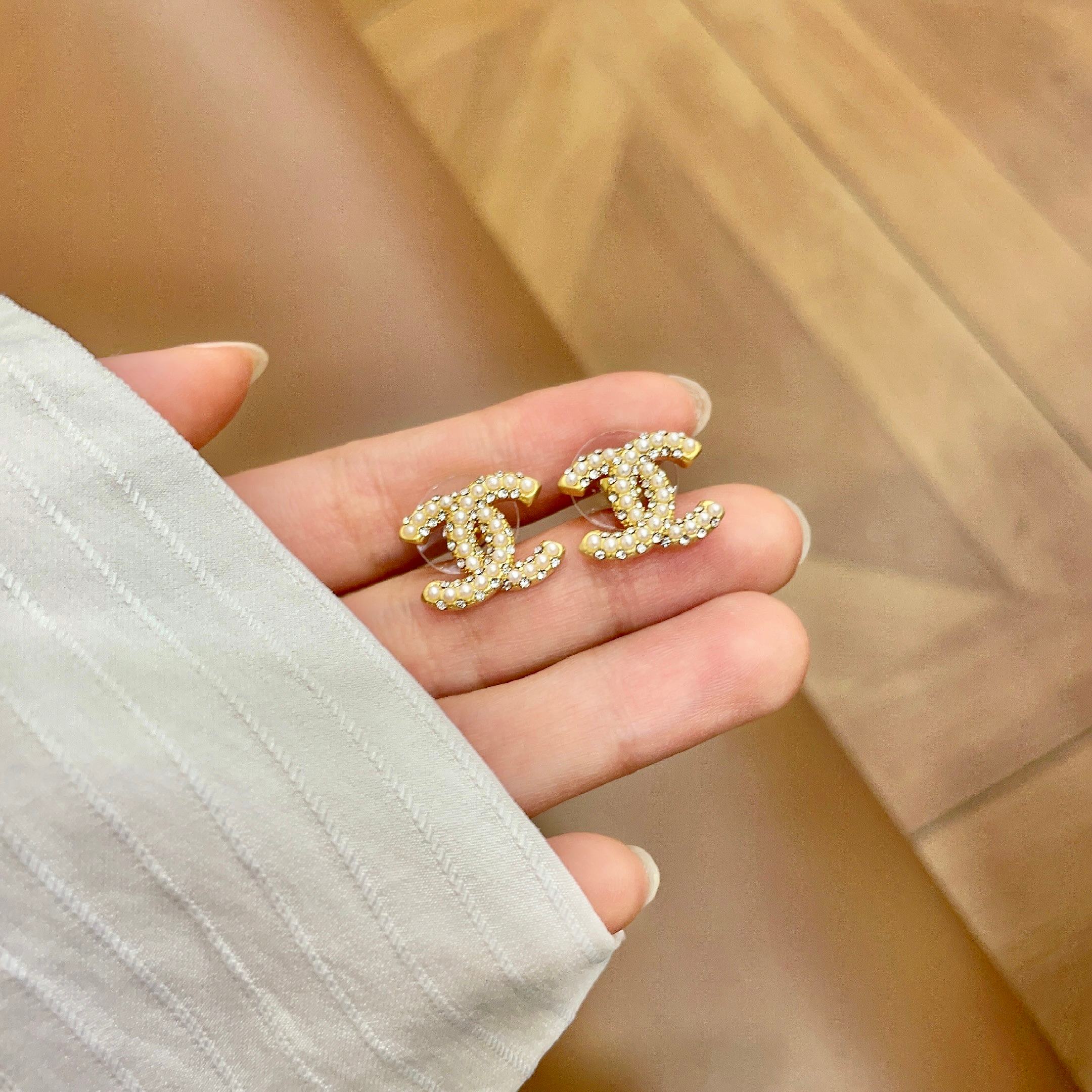 Chanel CC Pearl Stud Earrings earrings Gold-tone metal with cream faux pearls silver-tone metal with white faux pearls 1 5cm stud diameter
