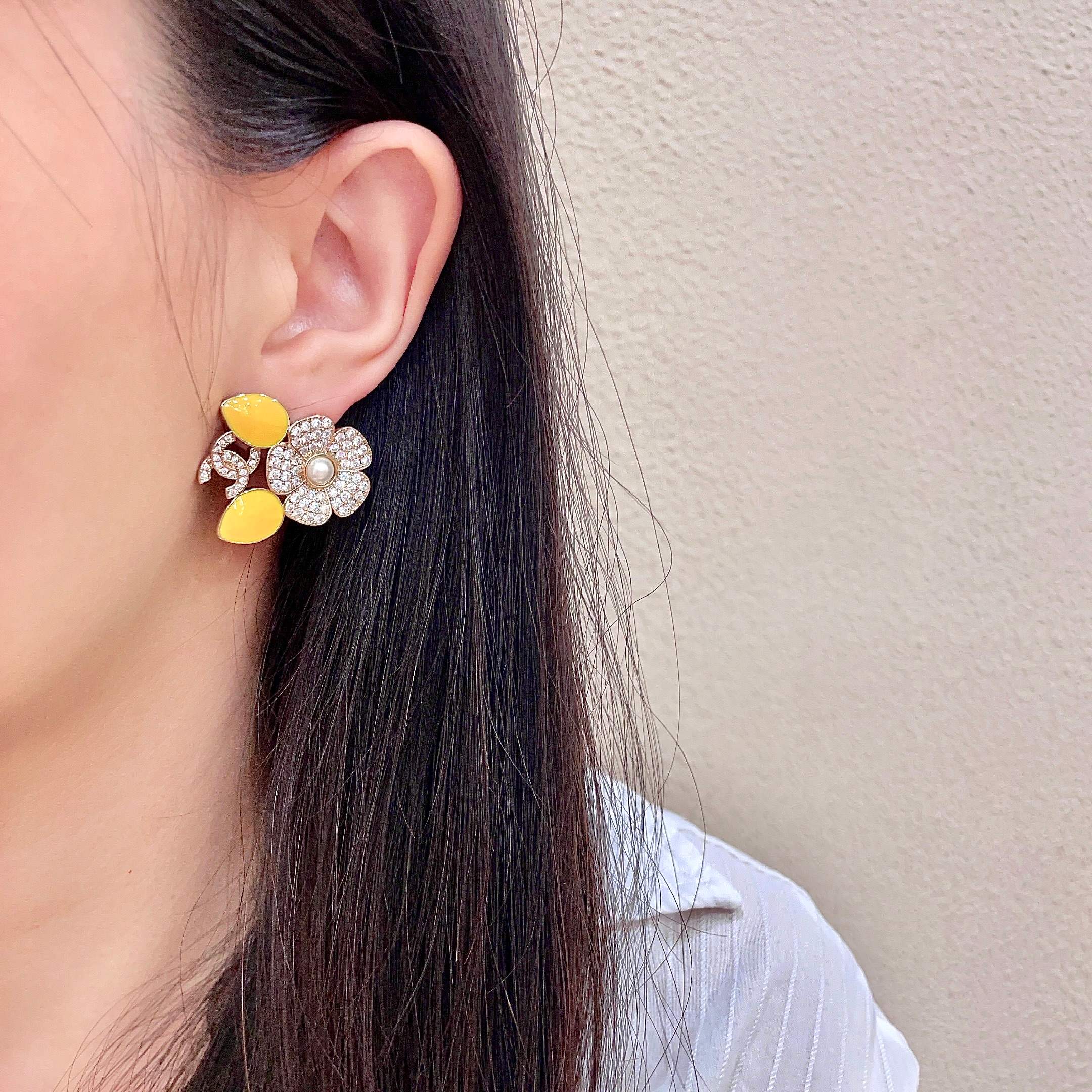Chanel CC Logo Crystal Flower Yellow Enamel Stud Earrings earrings Gold-tone metal clear crystal white faux pearl bright yellow enamel 2 5cm diameter per earring