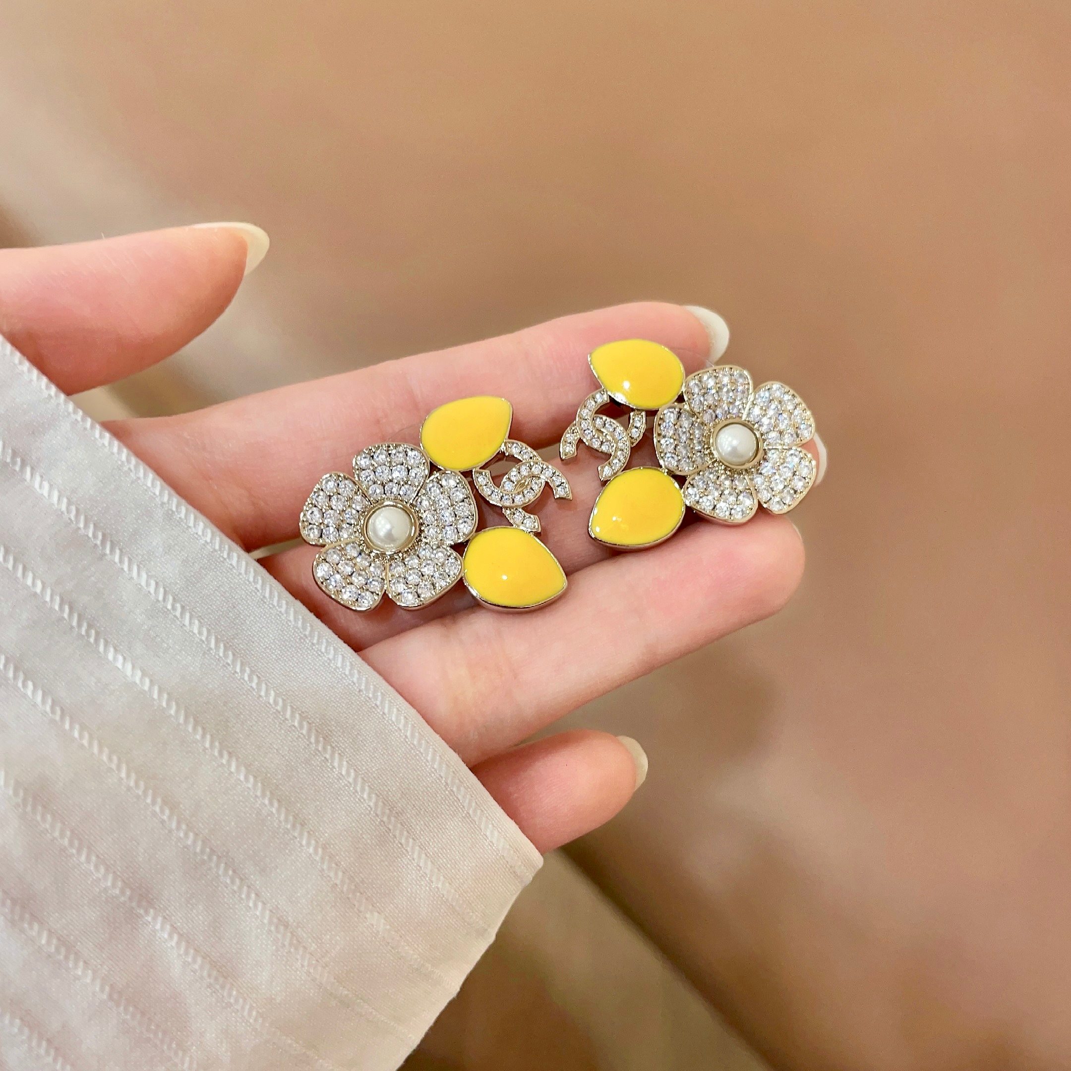 Chanel CC Logo Crystal Flower Yellow Enamel Stud Earrings earrings Gold-tone metal clear crystal white faux pearl bright yellow enamel 2 5cm diameter per earring