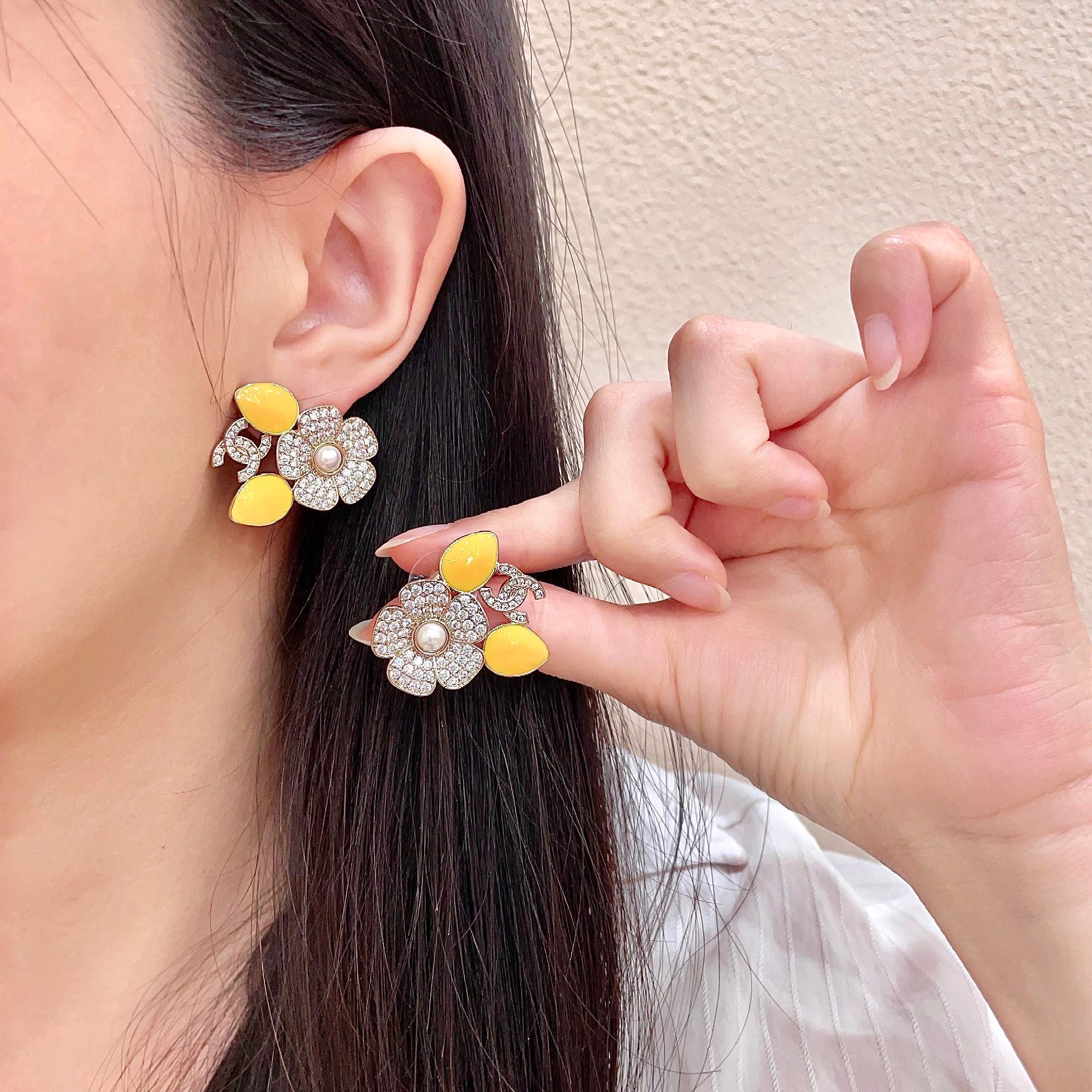 Chanel CC Logo Crystal Flower Yellow Enamel Stud Earrings earrings Gold-tone metal clear crystal white faux pearl bright yellow enamel 2 5cm diameter per earring