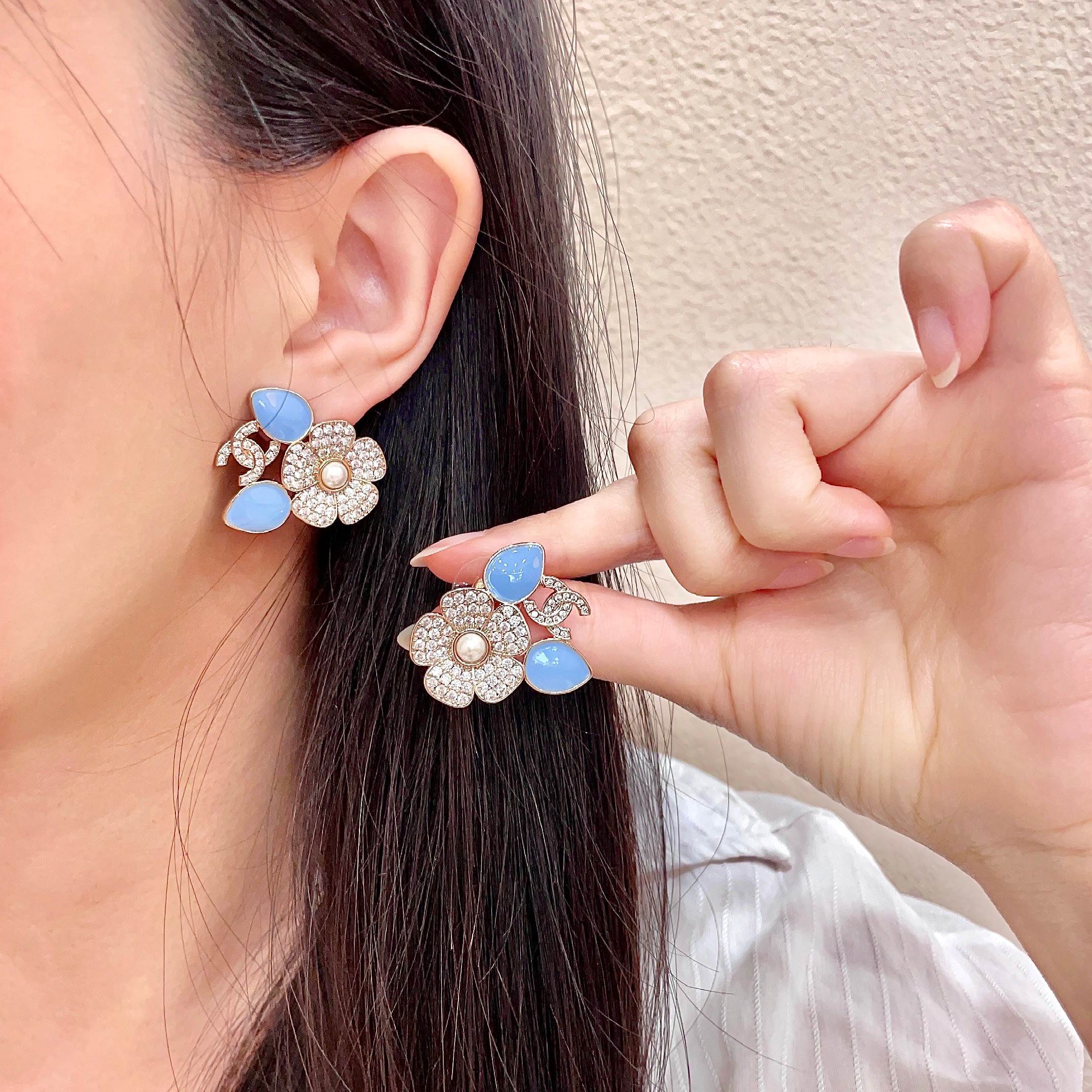 Chanel CC Logo Flower Enamel Stud Earrings earrings Gold-tone metal clear crystals white pearl center light blue enamel accents One Size 2 5cm width